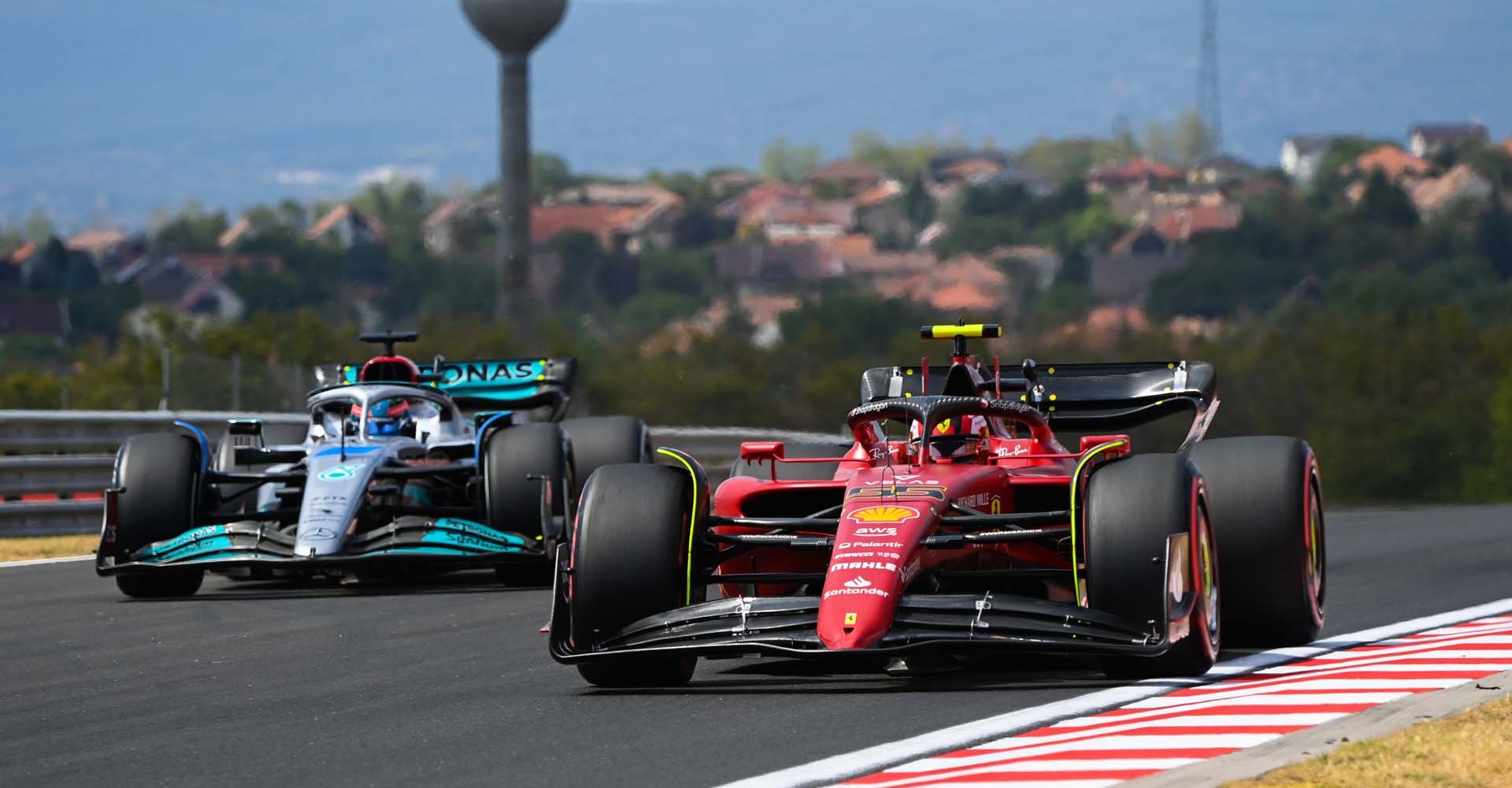 Carlos Sainz (Ferrari) & George Russell (Mercedes)