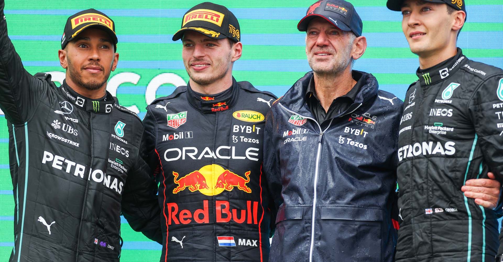 BUDAPEST, HUNGARY - JULY 31: Lewis Hamilton of Mercedes and Great Britain, Max Verstappen of Red Bull Racing and The Netherlands, Adrian Newey of Red Bull and Great Britain and George Russell of Mercedes and Great Britain on the podium during the F1 Grand Prix of Hungary at Hungaroring on July 31, 2022 in Budapest, Hungary. (Photo by Peter Fox/Getty Images)