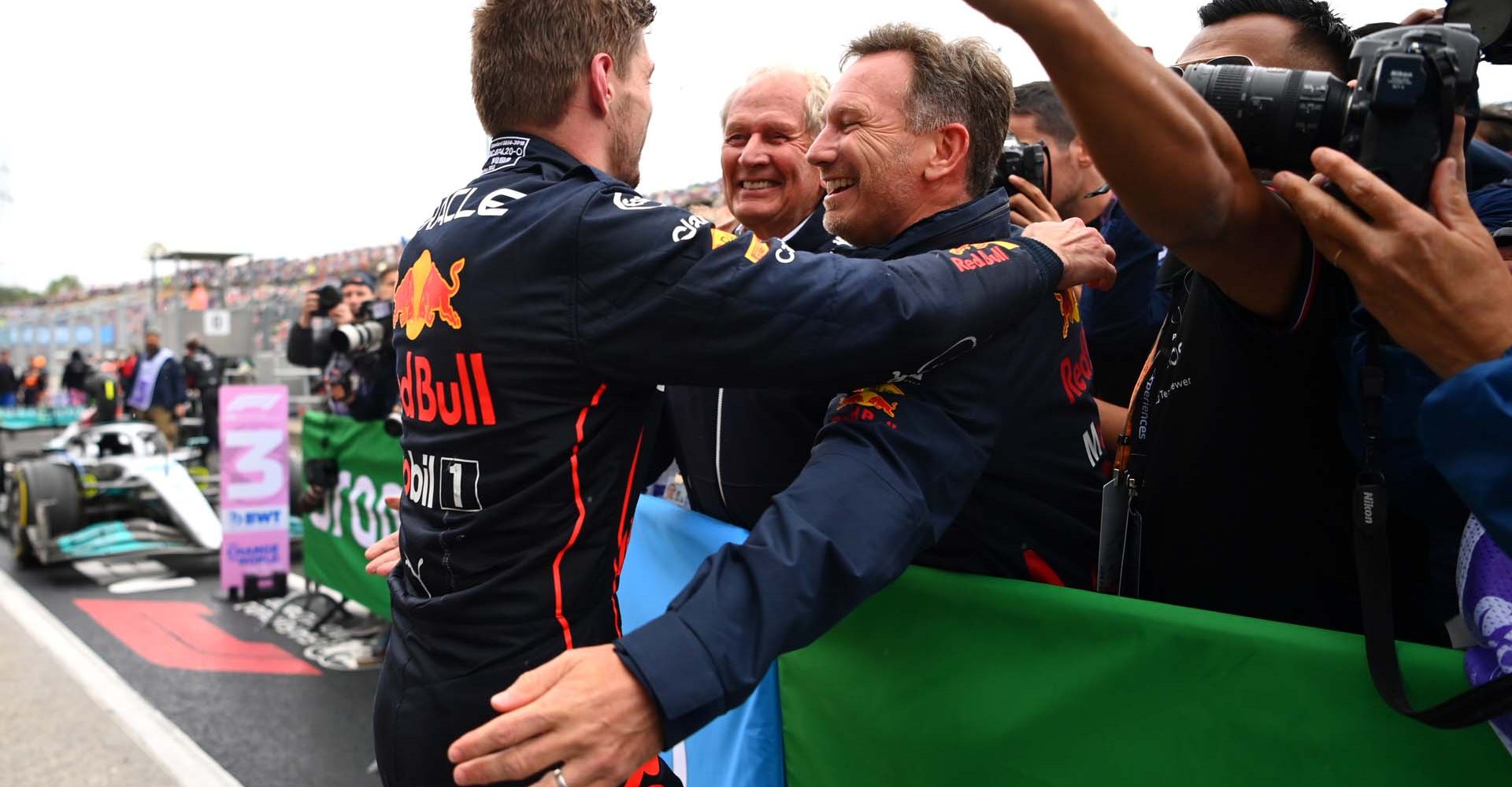 BUDAPEST, HUNGARY - JULY 31: Race winner Max Verstappen of the Netherlands and Oracle Red Bull Racing celebrates with Red Bull Racing Team Principal Christian Horner and Red Bull Racing Team Consultant Dr Helmut Marko in parc ferme during the F1 Grand Prix of Hungary at Hungaroring on July 31, 2022 in Budapest, Hungary. (Photo by Dan Mullan/Getty Images)