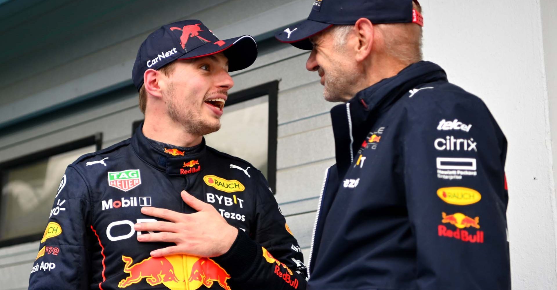 BUDAPEST, HUNGARY - JULY 31: Race winner Max Verstappen of the Netherlands and Oracle Red Bull Racing talks with Adrian Newey, the Chief Technical Officer of Red Bull Racing in parc ferme during the F1 Grand Prix of Hungary at Hungaroring on July 31, 2022 in Budapest, Hungary. (Photo by Dan Mullan/Getty Images)