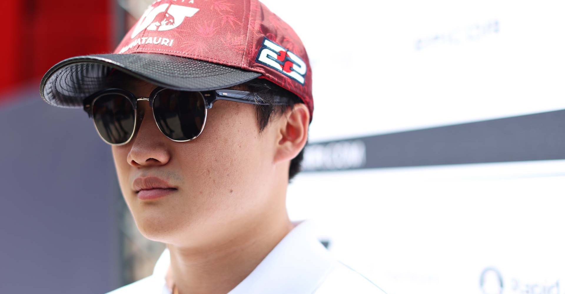 BUDAPEST, HUNGARY - JULY 28: Yuki Tsunoda of Japan and Scuderia AlphaTauri talks to the media in the Paddock during previews ahead of the F1 Grand Prix of Hungary at Hungaroring on July 28, 2022 in Budapest, Hungary. (Photo by Peter Fox/Getty Images)