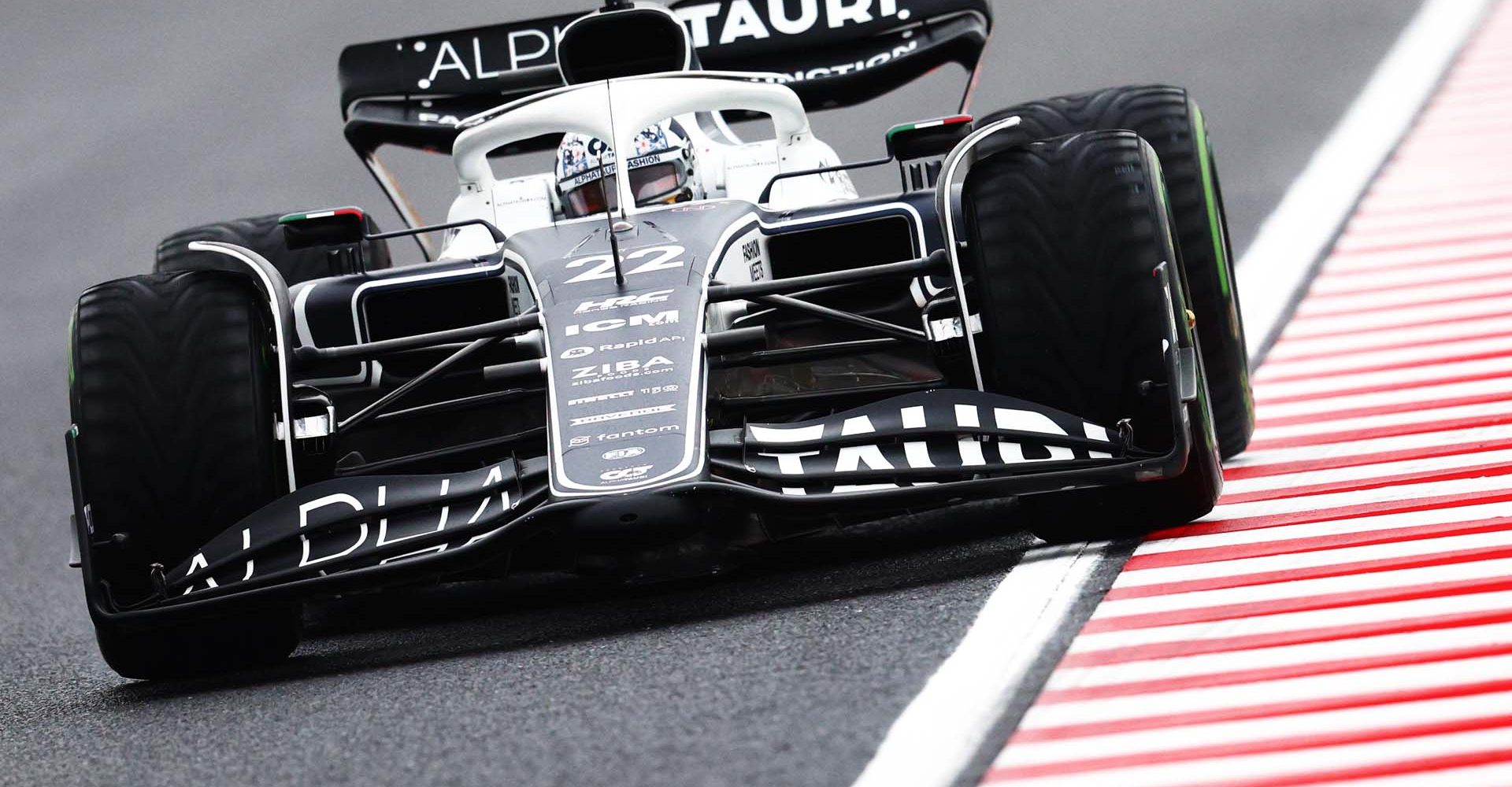 SUZUKA, JAPAN - OCTOBER 07: Yuki Tsunoda of Japan driving the (22) Scuderia AlphaTauri AT03 on track during practice ahead of the F1 Grand Prix of Japan at Suzuka International Racing Course on October 07, 2022 in Suzuka, Japan. (Photo by Clive Rose/Getty Images)