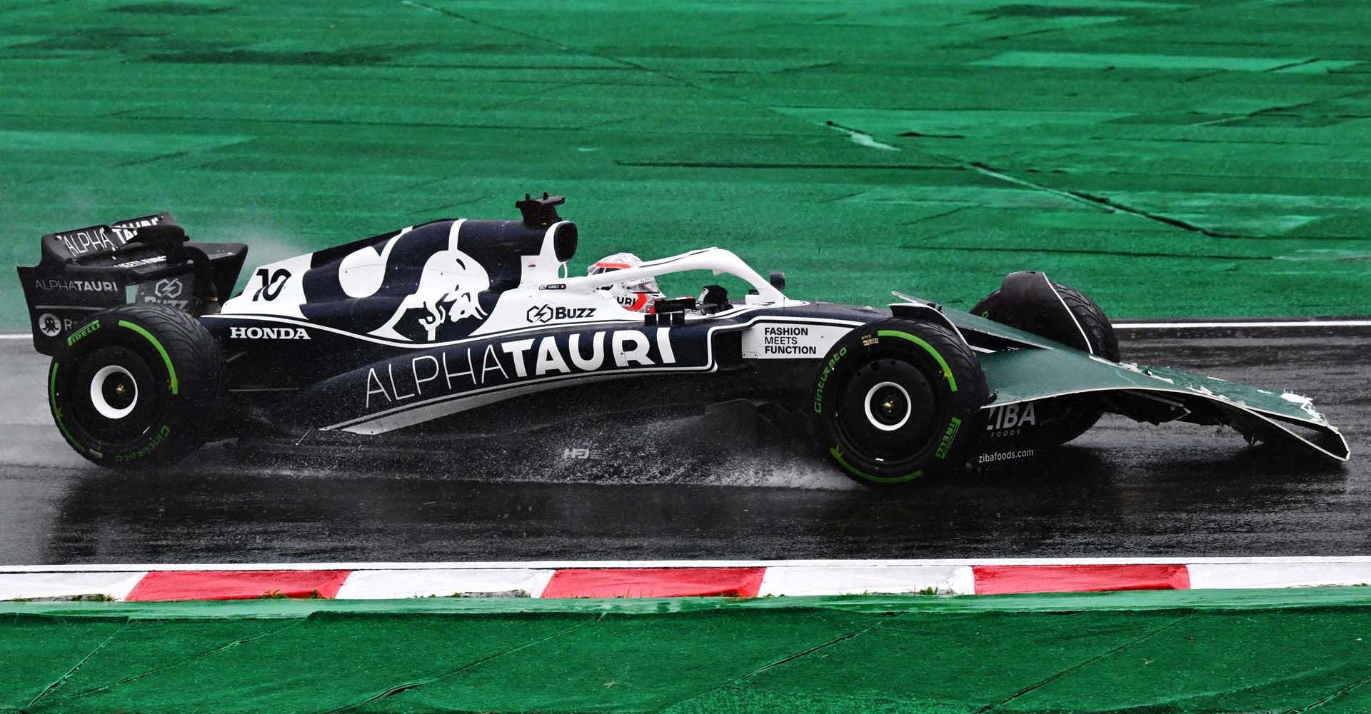 SUZUKA, JAPAN - OCTOBER 09: Pierre Gasly of France driving the (10) Scuderia AlphaTauri AT03 on track during the F1 Grand Prix of Japan at Suzuka International Racing Course on October 09, 2022 in Suzuka, Japan. (Photo by Clive Mason/Getty Images)