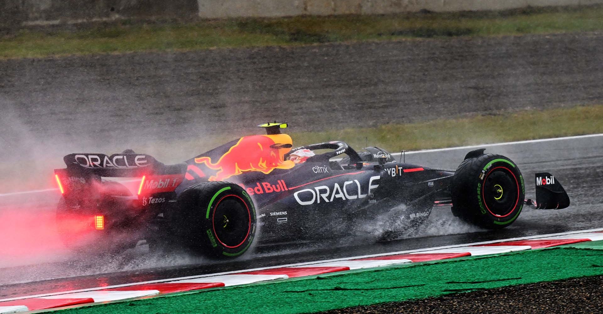 SUZUKA, JAPAN - OCTOBER 09: Sergio Perez of Mexico driving the (11) Oracle Red Bull Racing RB18 on track during the F1 Grand Prix of Japan at Suzuka International Racing Course on October 09, 2022 in Suzuka, Japan. (Photo by Clive Mason/Getty Images)