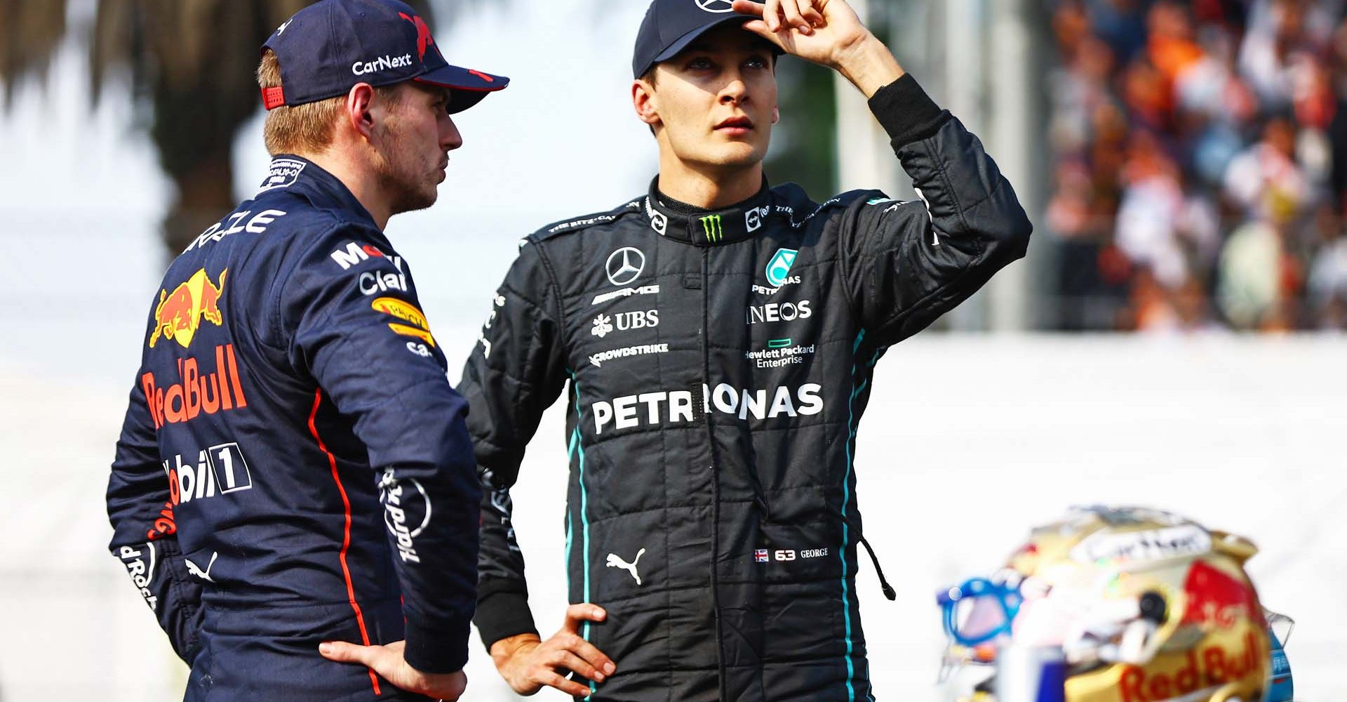 MEXICO CITY, MEXICO - OCTOBER 29: Pole position qualifier Max Verstappen of the Netherlands and Oracle Red Bull Racing and Second placed qualifier George Russell of Great Britain and Mercedes talk in parc ferme during qualifying ahead of the F1 Grand Prix of Mexico at Autodromo Hermanos Rodriguez on October 29, 2022 in Mexico City, Mexico. (Photo by Mark Thompson/Getty Images )