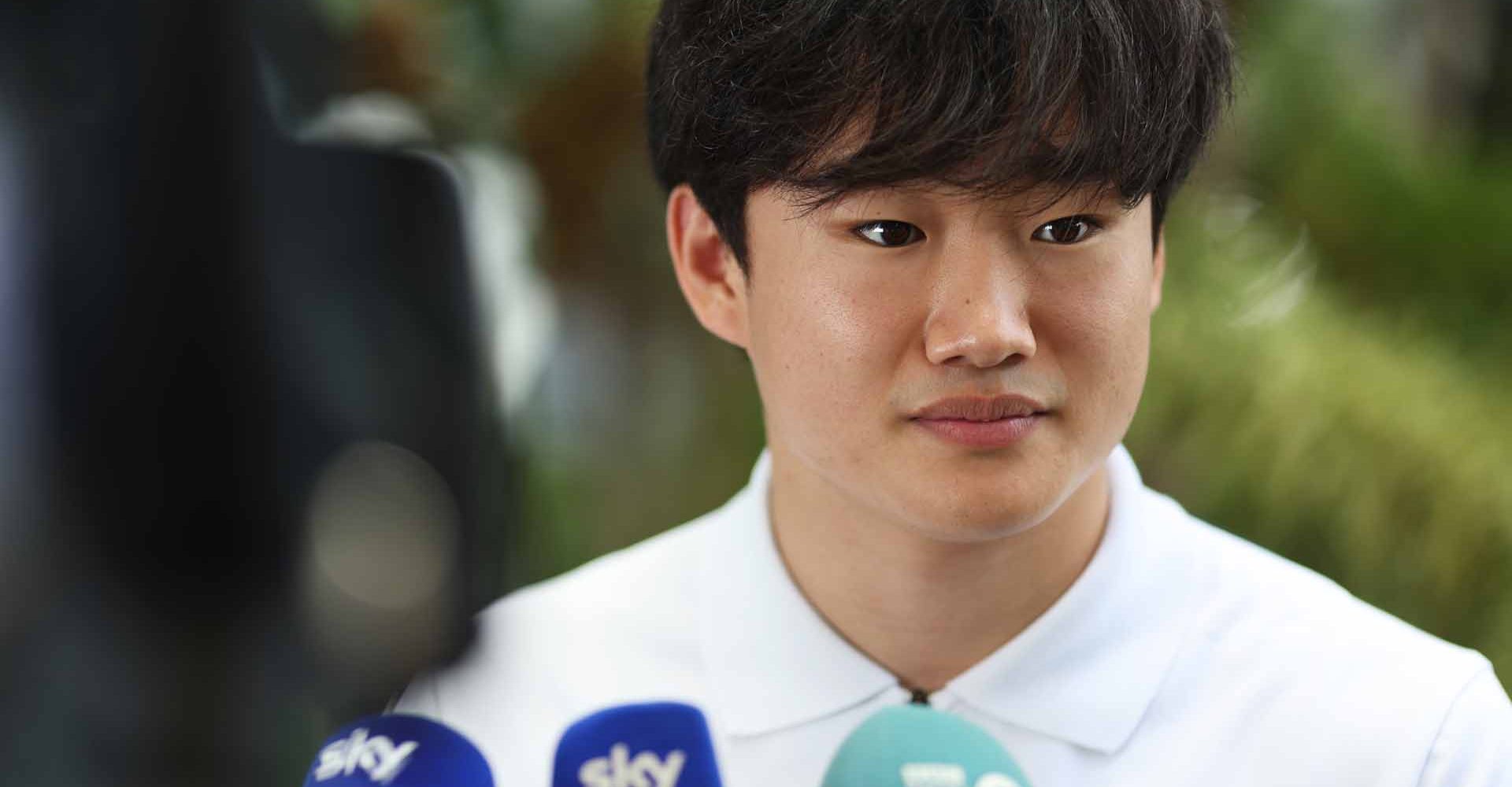 MIAMI, FLORIDA - MAY 06: Yuki Tsunoda of Japan and Scuderia AlphaTauri talks to the media in the Paddock prior to practice ahead of the F1 Grand Prix of Miami at the Miami International Autodrome on May 06, 2022 in Miami, Florida. (Photo by Peter Fox/Getty Images)