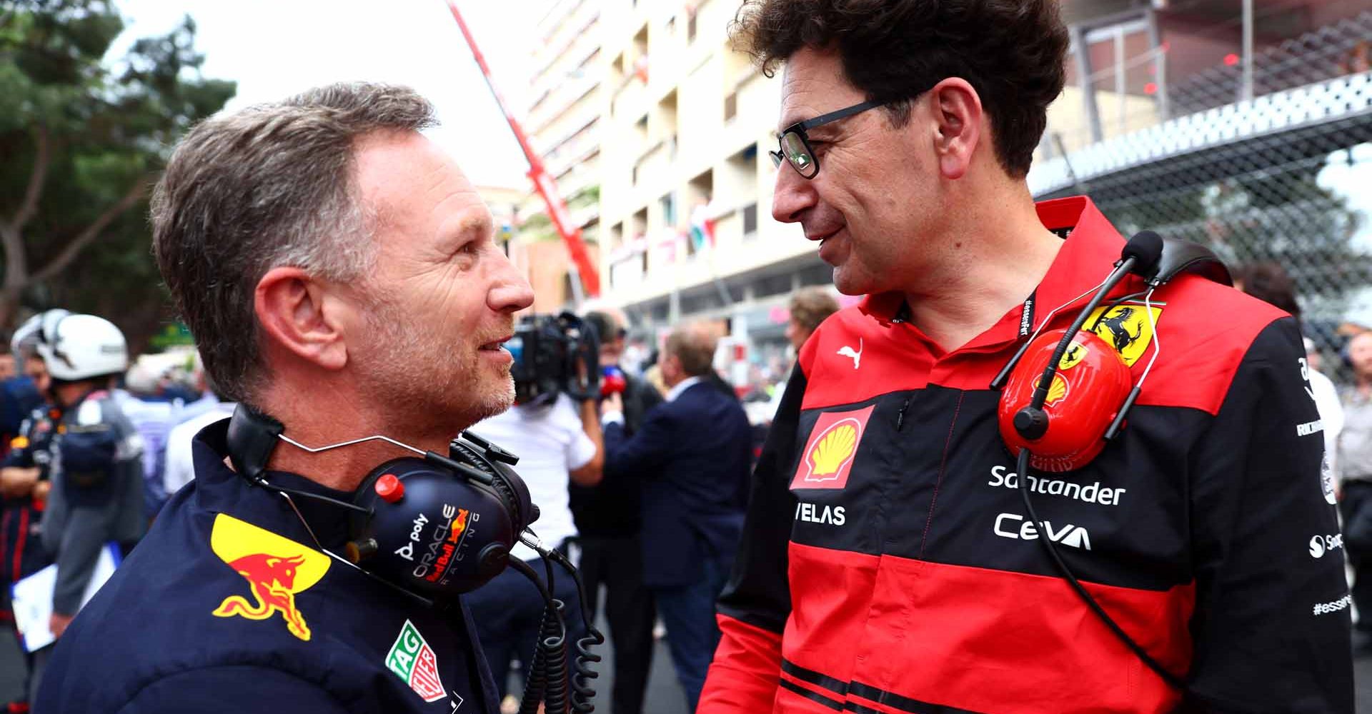 MONTE-CARLO, MONACO - MAY 29: Red Bull Racing Team Principal Christian Horner talks with Scuderia Ferrari Team Principal Mattia Binotto on the grid ahead of the F1 Grand Prix of Monaco at Circuit de Monaco on May 29, 2022 in Monte-Carlo, Monaco. (Photo by Mark Thompson/Getty Images)