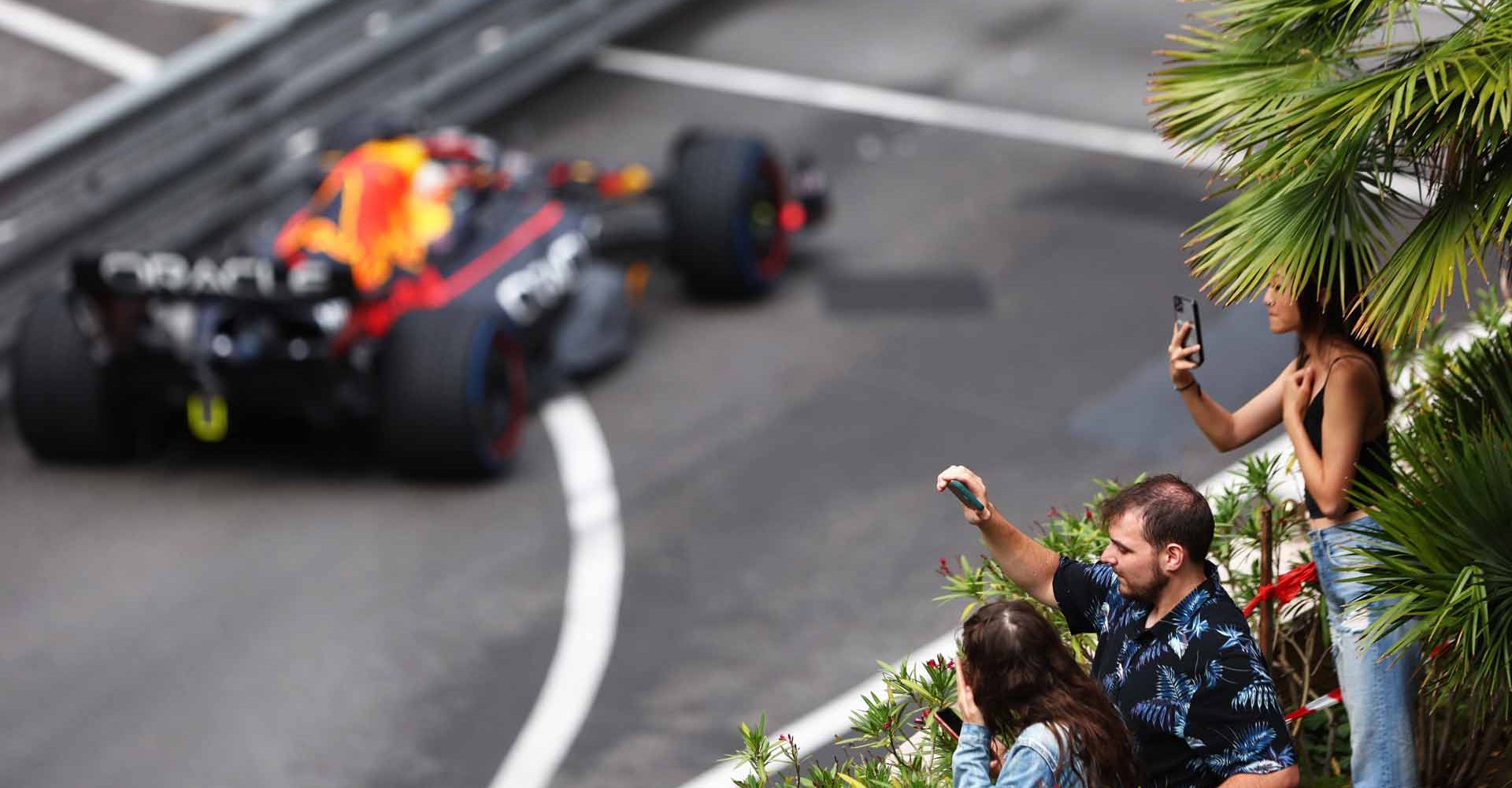 MONTE-CARLO, MONACO - MAY 29: Fans take pictures as Max Verstappen of the Netherlands driving the (1) Oracle Red Bull Racing RB18 passes during the F1 Grand Prix of Monaco at Circuit de Monaco on May 29, 2022 in Monte-Carlo, Monaco. (Photo by Clive Rose/Getty Images) beauty