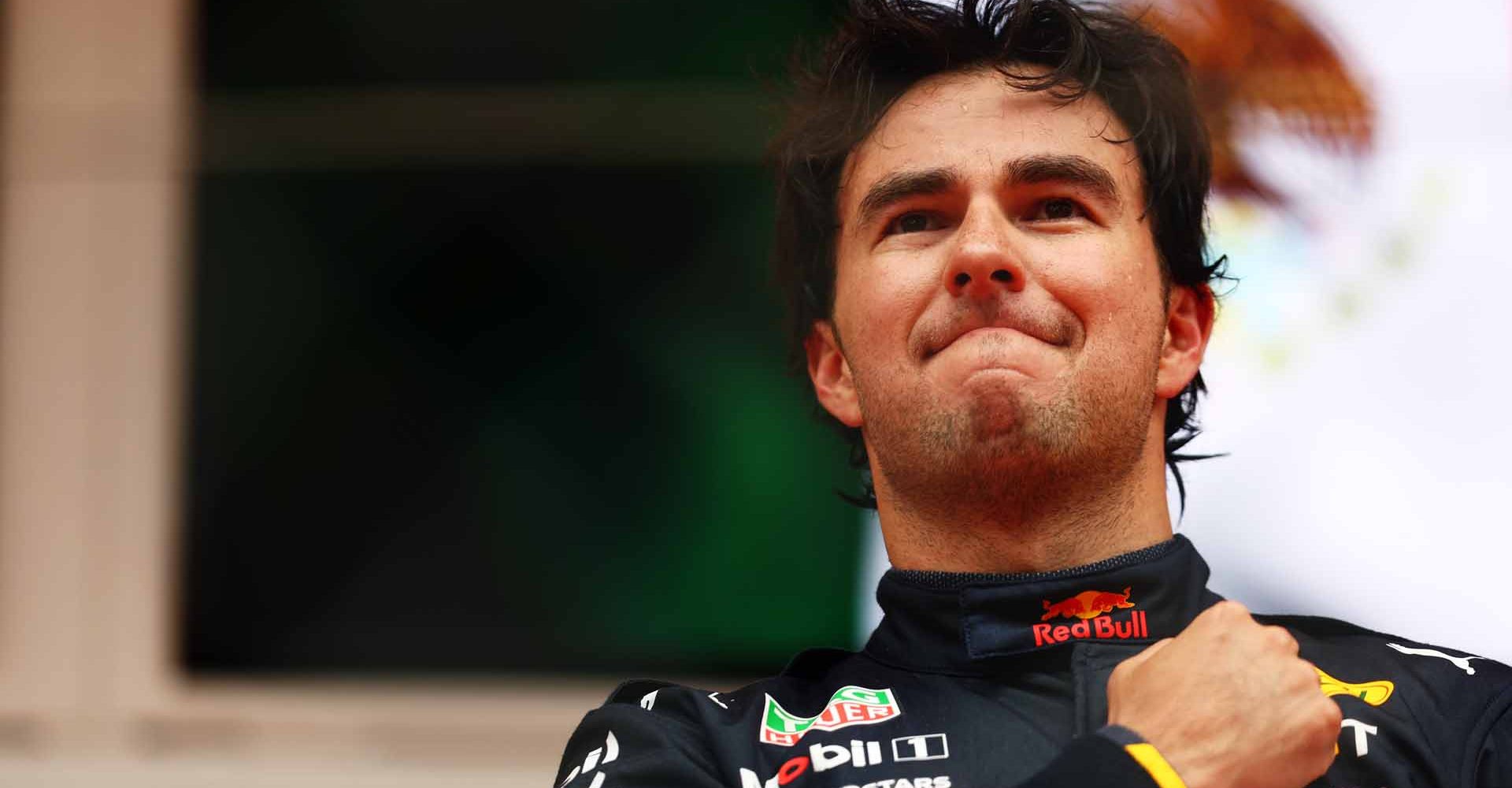 MONTE-CARLO, MONACO - MAY 29: Race winner Sergio Perez of Mexico and Oracle Red Bull Racing celebrates on the podium during the F1 Grand Prix of Monaco at Circuit de Monaco on May 29, 2022 in Monte-Carlo, Monaco. (Photo by Mark Thompson/Getty Images)