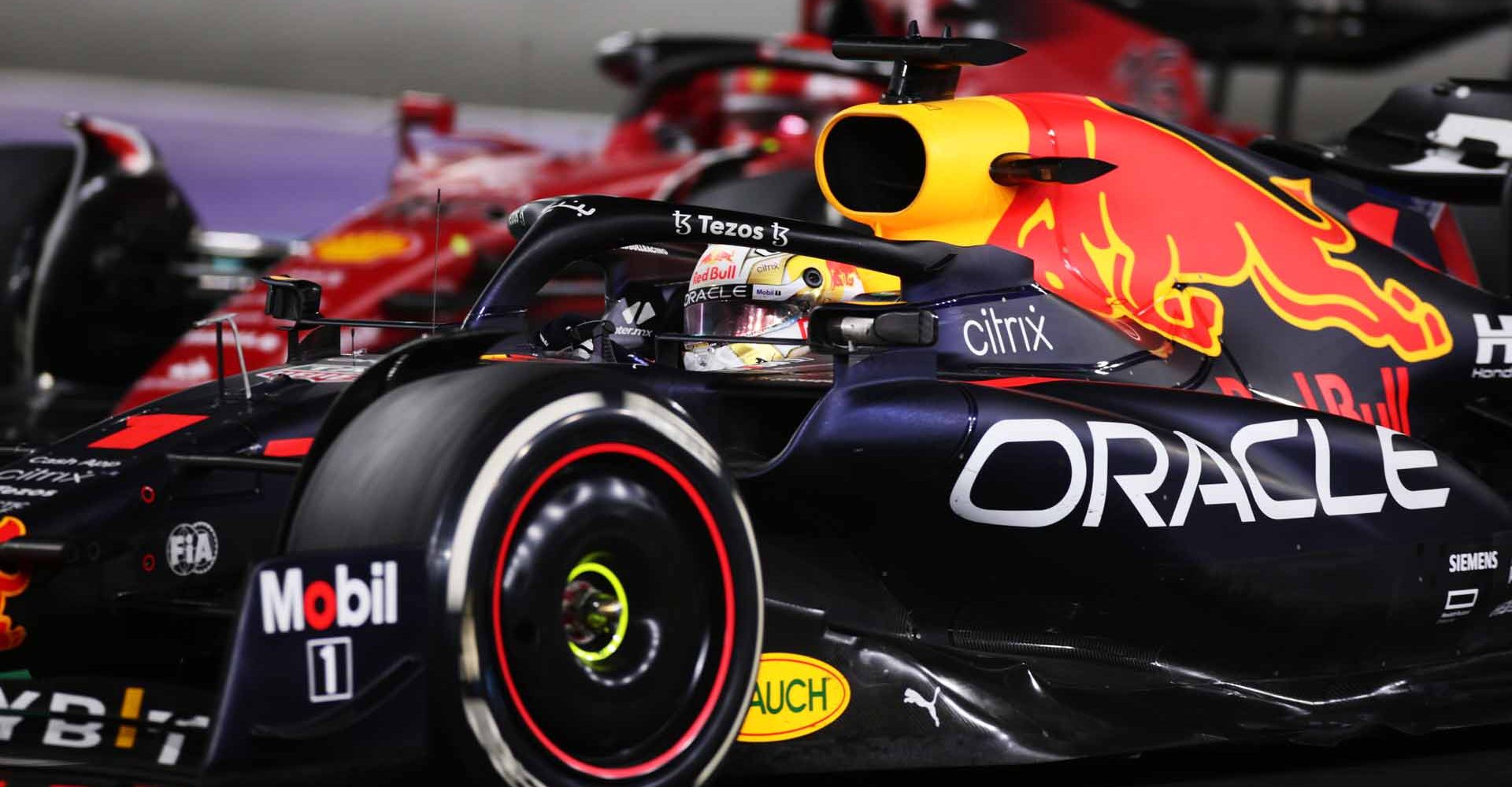 JEDDAH, SAUDI ARABIA - MARCH 27: Max Verstappen of the Netherlands driving the (1) Oracle Red Bull Racing RB18 leads Charles Leclerc of Monaco driving (16) the Ferrari F1-75 during the F1 Grand Prix of Saudi Arabia at the Jeddah Corniche Circuit on March 27, 2022 in Jeddah, Saudi Arabia. (Photo by Peter Fox/Getty Images)