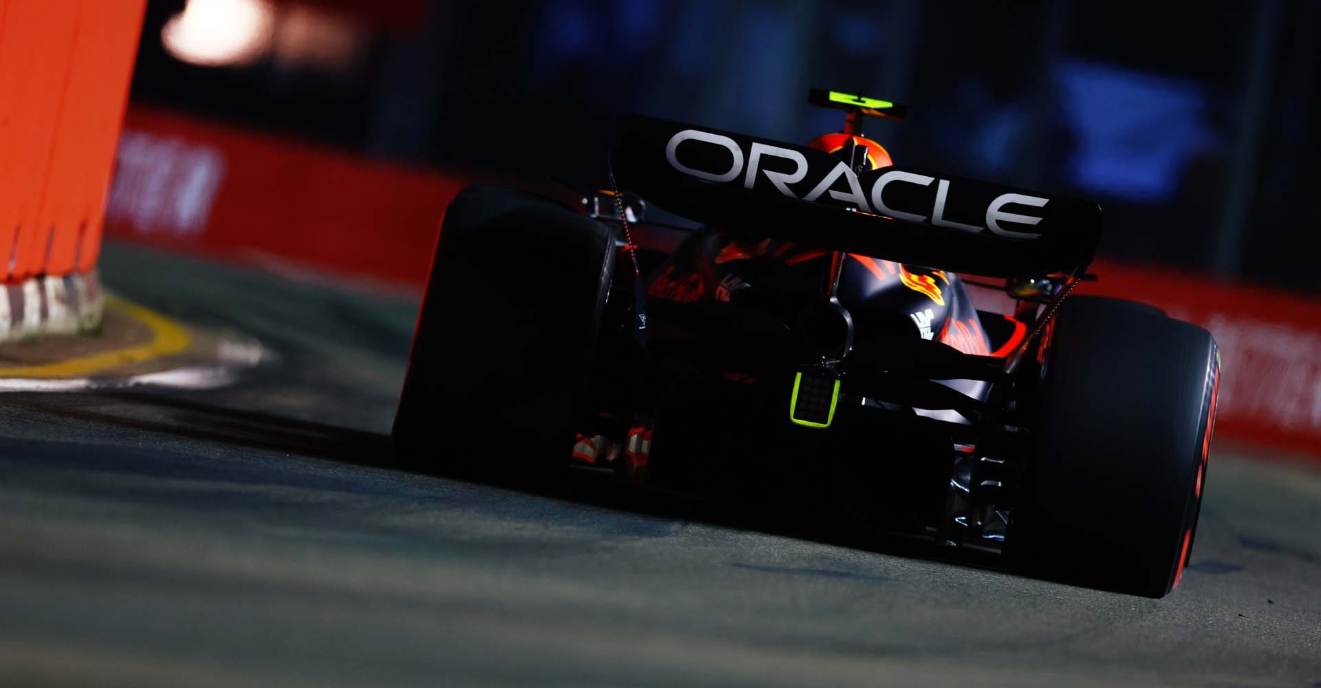 SINGAPORE, SINGAPORE - SEPTEMBER 30: Sergio Perez of Mexico driving the (11) Oracle Red Bull Racing RB18 on track during practice ahead of the F1 Grand Prix of Singapore at Marina Bay Street Circuit on September 30, 2022 in Singapore, Singapore. (Photo by Mark Thompson/Getty Images,)