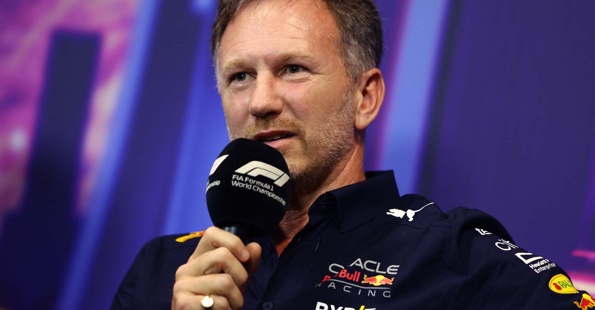 SINGAPORE, SINGAPORE - OCTOBER 01: Red Bull Racing Team Principal Christian Horner talks in the team principal's press conference before final practice ahead of the F1 Grand Prix of Singapore at Marina Bay Street Circuit on October 01, 2022 in Singapore, Singapore. (Photo by Clive Rose/Getty Images,)