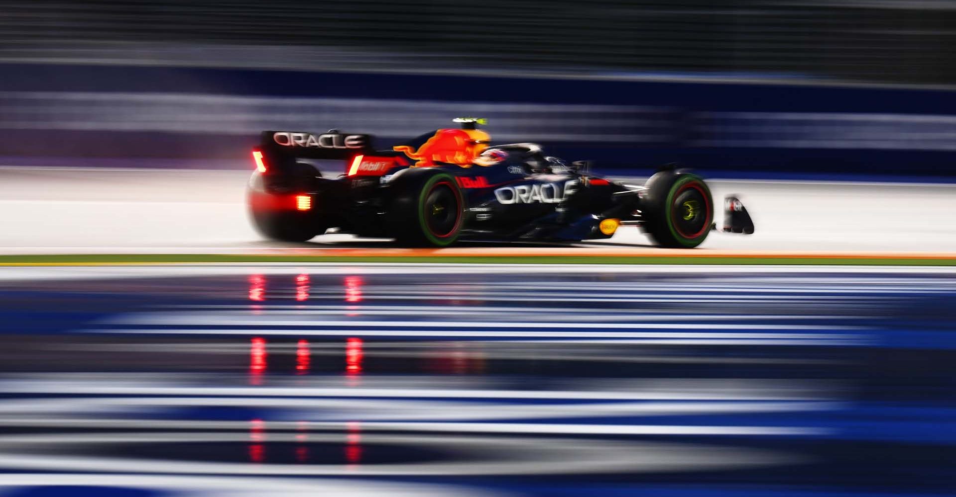 SINGAPORE, SINGAPORE - OCTOBER 01: Sergio Perez of Mexico driving the (11) Oracle Red Bull Racing RB18 on track during final practice ahead of the F1 Grand Prix of Singapore at Marina Bay Street Circuit on October 01, 2022 in Singapore, Singapore. (Photo by Clive Mason/Getty Images)