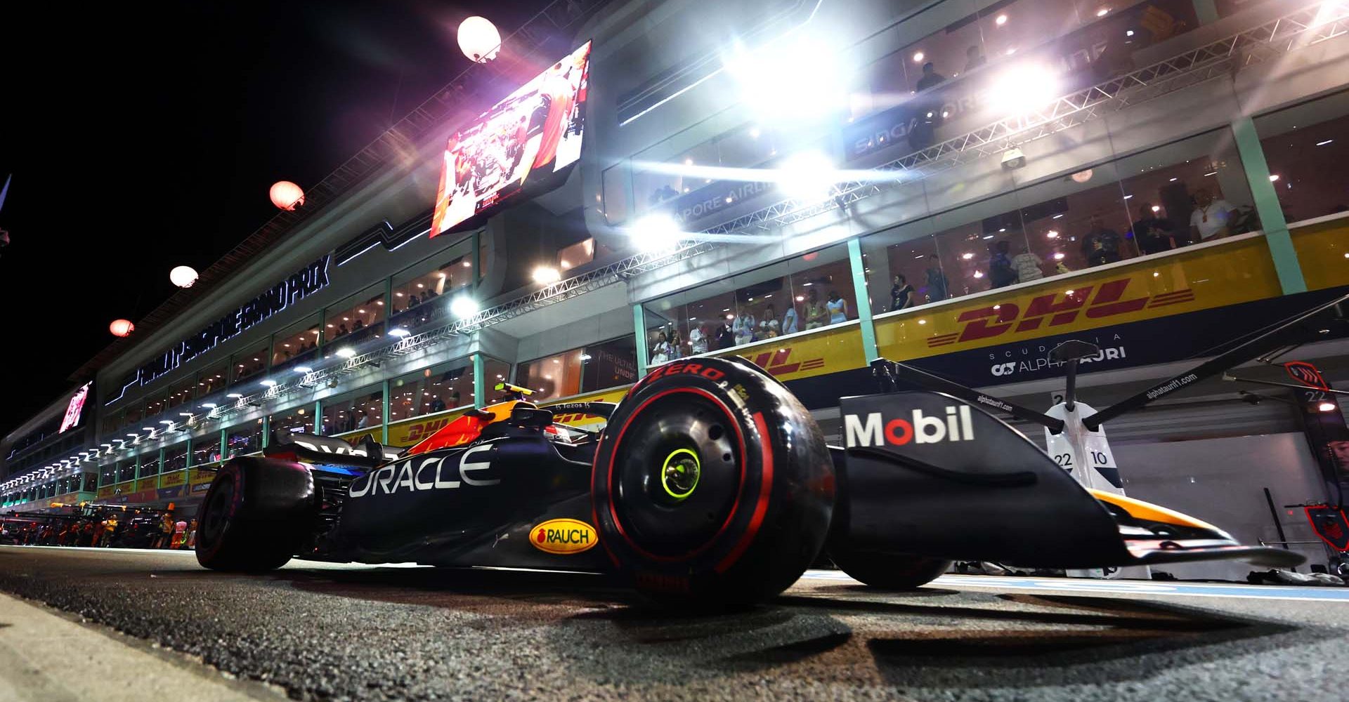 SINGAPORE, SINGAPORE - OCTOBER 01: Sergio Perez of Mexico driving the (11) Oracle Red Bull Racing RB18 in the Pitlane during qualifying ahead of the F1 Grand Prix of Singapore at Marina Bay Street Circuit on October 01, 2022 in Singapore, Singapore. (Photo by Mark Thompson/Getty Images,)