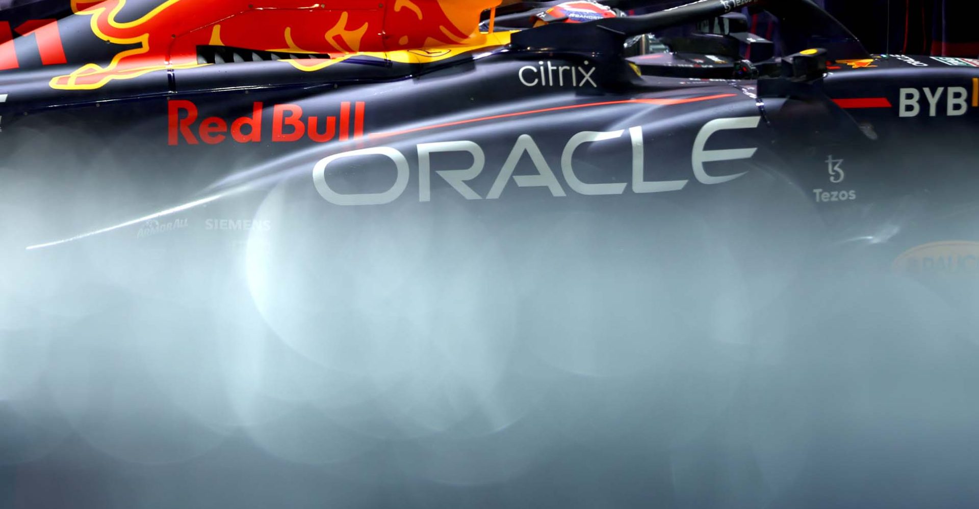 SINGAPORE, SINGAPORE - OCTOBER 02: Sergio Perez of Mexico driving the (11) Oracle Red Bull Racing RB18 leaves the garage prior to the F1 Grand Prix of Singapore at Marina Bay Street Circuit on October 02, 2022 in Singapore, Singapore. (Photo by Mark Thompson/Getty Images,)