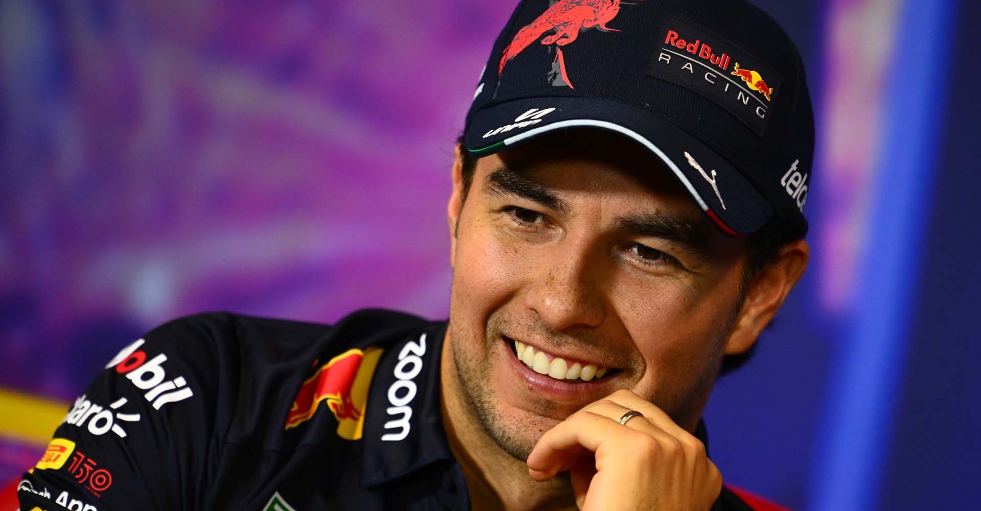 SINGAPORE, SINGAPORE - SEPTEMBER 29: Sergio Perez of Mexico and Oracle Red Bull Racing attends the Drivers Press Conference during previews ahead of the F1 Grand Prix of Singapore at Marina Bay Street Circuit on September 29, 2022 in Singapore, Singapore. (Photo by Clive Mason/Getty Images,)