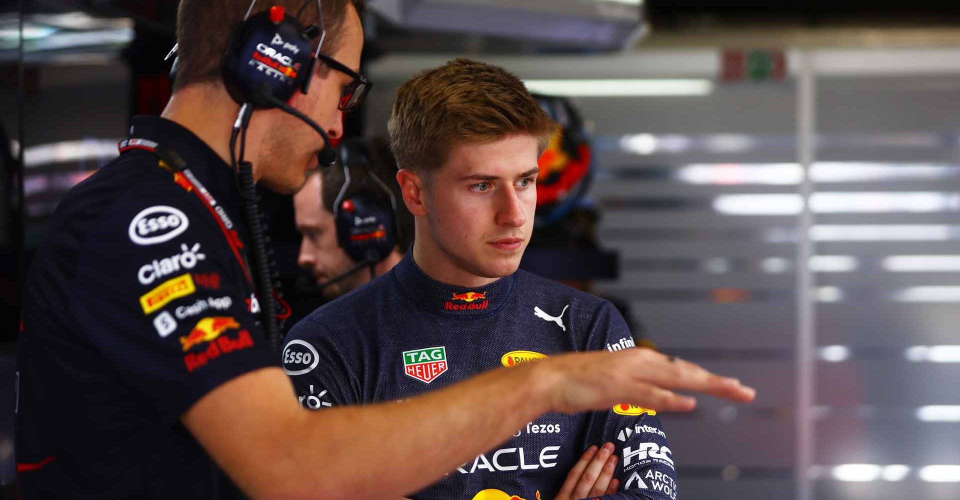 BARCELONA, SPAIN - MAY 20: Juri Vips of Estonia and Oracle Red Bull Racing talks with race engineer Hugh Bird in the garage during practice ahead of the F1 Grand Prix of Spain at Circuit de Barcelona-Catalunya on May 20, 2022 in Barcelona, Spain. (Photo by Mark Thompson/Getty Images)