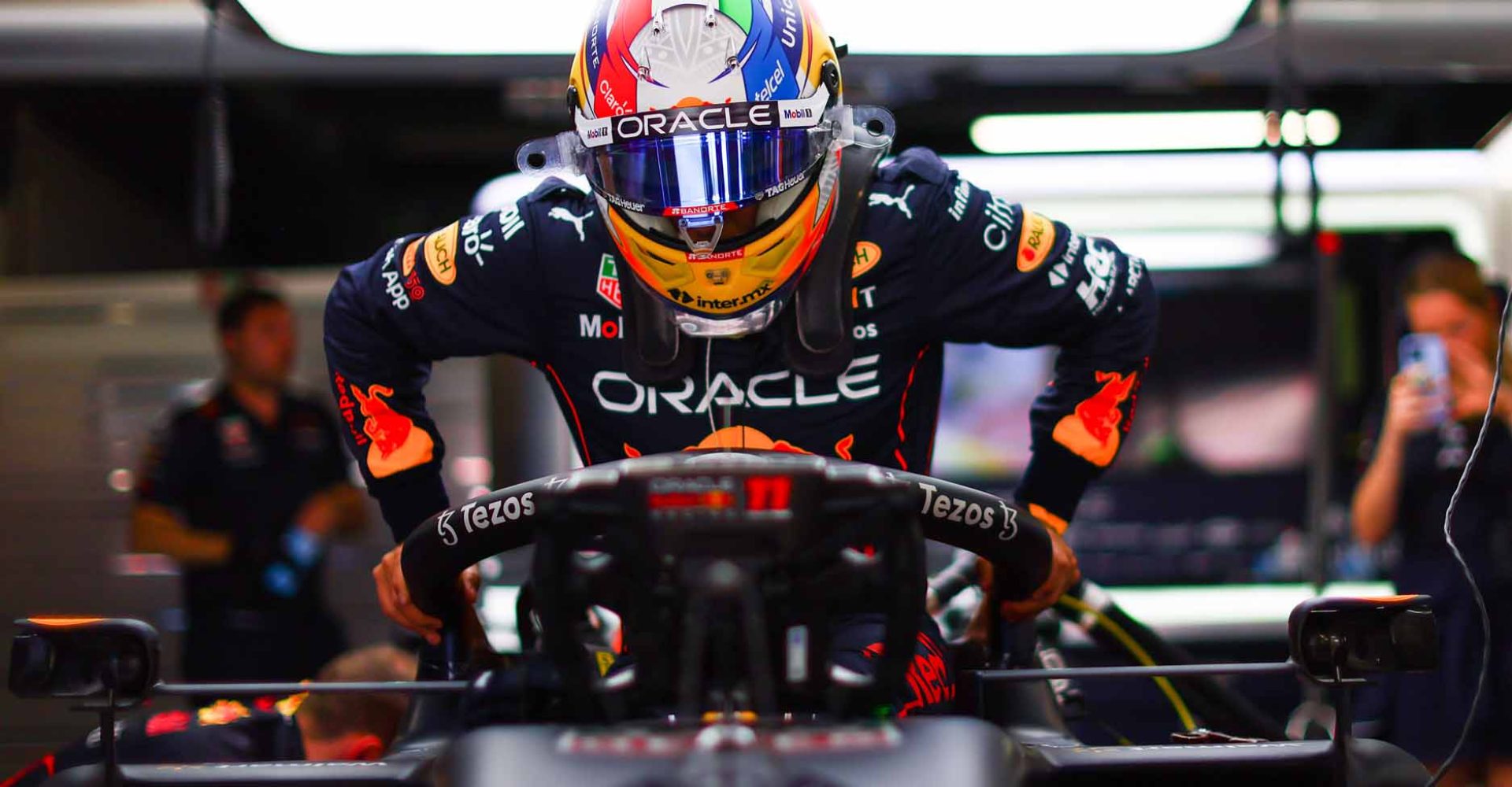 BARCELONA, SPAIN - MAY 21: Sergio Perez of Mexico and Oracle Red Bull Racing prepares to drive in the garage during qualifying ahead of the F1 Grand Prix of Spain at Circuit de Barcelona-Catalunya on May 21, 2022 in Barcelona, Spain. (Photo by Mark Thompson/Getty Images)