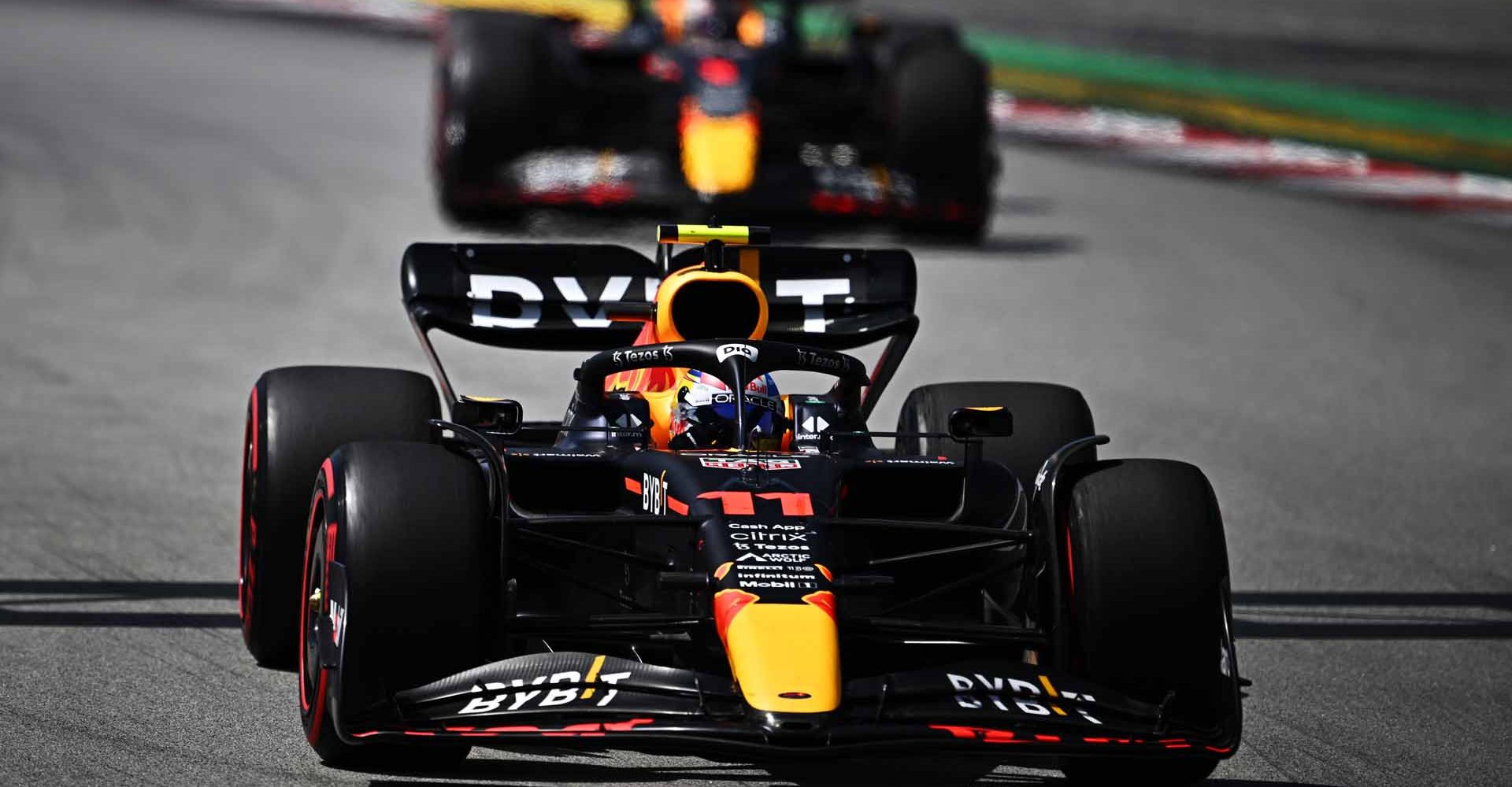 BARCELONA, SPAIN - MAY 22: Sergio Perez of Mexico driving the (11) Oracle Red Bull Racing RB18 leads Max Verstappen of the Netherlands driving the (1) Oracle Red Bull Racing RB18 during the F1 Grand Prix of Spain at Circuit de Barcelona-Catalunya on May 22, 2022 in Barcelona, Spain. (Photo by Clive Mason/Getty Images)