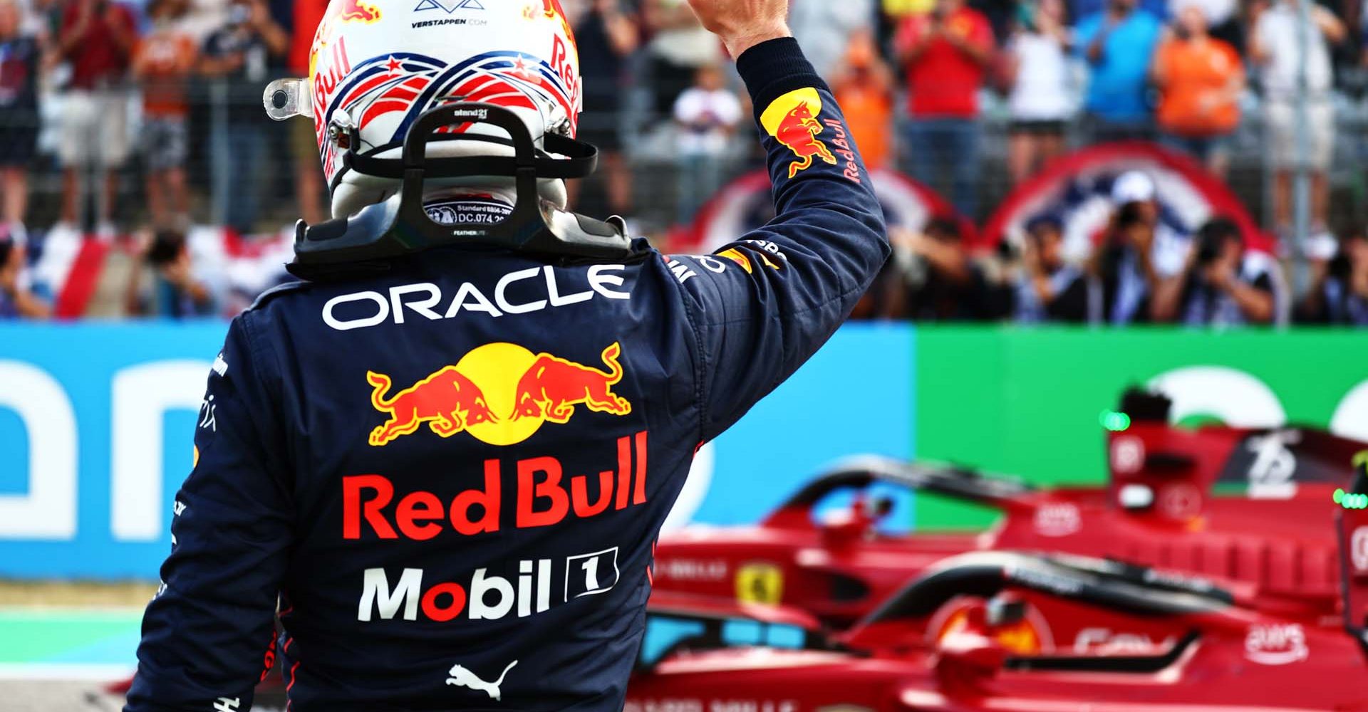 AUSTIN, TEXAS - OCTOBER 22: Third placed qualifier Max Verstappen of the Netherlands and Oracle Red Bull Racing waves to the crowd from parc ferme during qualifying ahead of the F1 Grand Prix of USA at Circuit of The Americas on October 22, 2022 in Austin, Texas. (Photo by Mark Thompson/Getty Images )