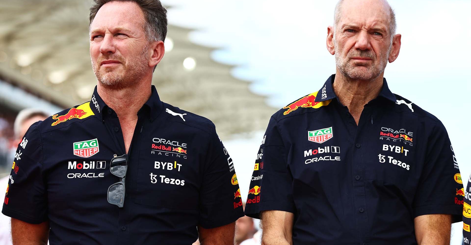 AUSTIN, TEXAS - OCTOBER 23: Red Bull Racing Team Principal Christian Horner and Adrian Newey, the Chief Technical Officer of Red Bull Racing stand in tribute to the late Dietrich Mateschitz on the grid during the F1 Grand Prix of USA at Circuit of The Americas on October 23, 2022 in Austin, Texas. (Photo by Mark Thompson/Getty Images)