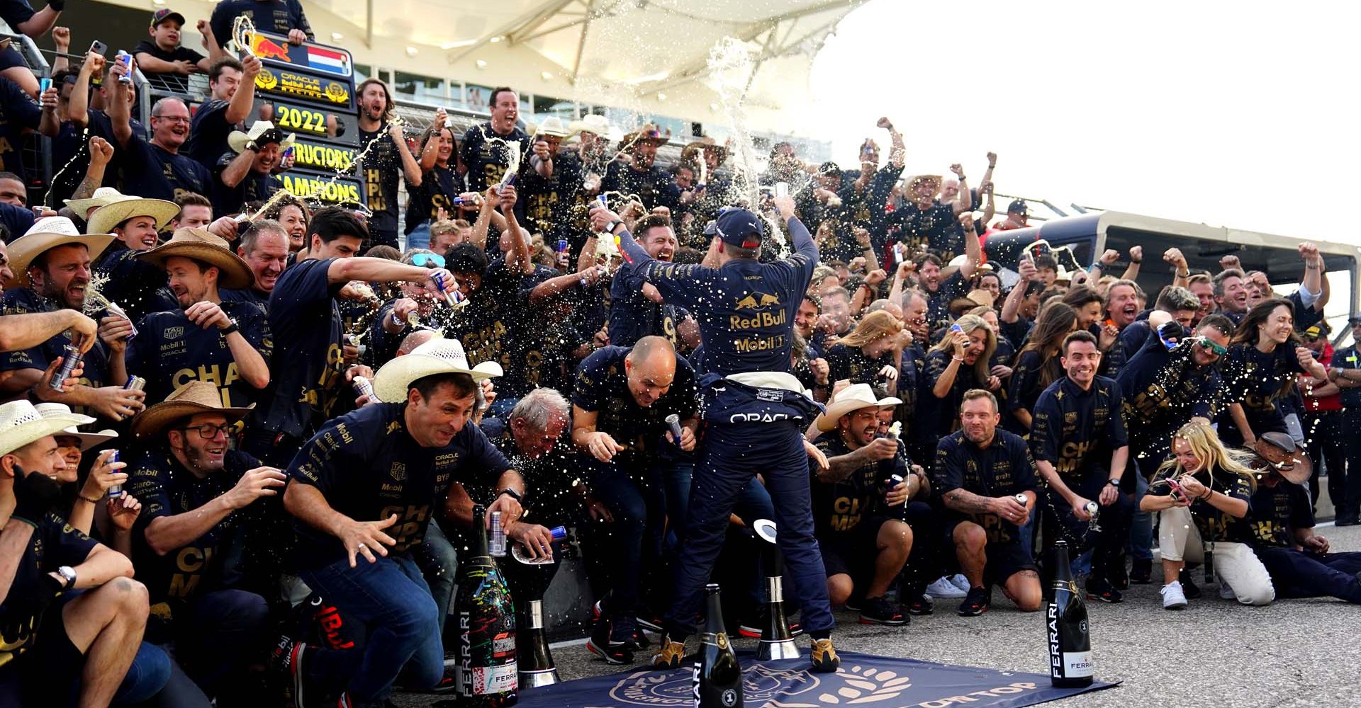 AUSTIN, TEXAS - OCTOBER 23: Race winner Max Verstappen of the Netherlands and Oracle Red Bull Racing celebrates winning the F1 World Constructors Championship with his team after the F1 Grand Prix of USA at Circuit of The Americas on October 23, 2022 in Austin, Texas. (Photo by Alex Bierens de Haan/Getty Images)