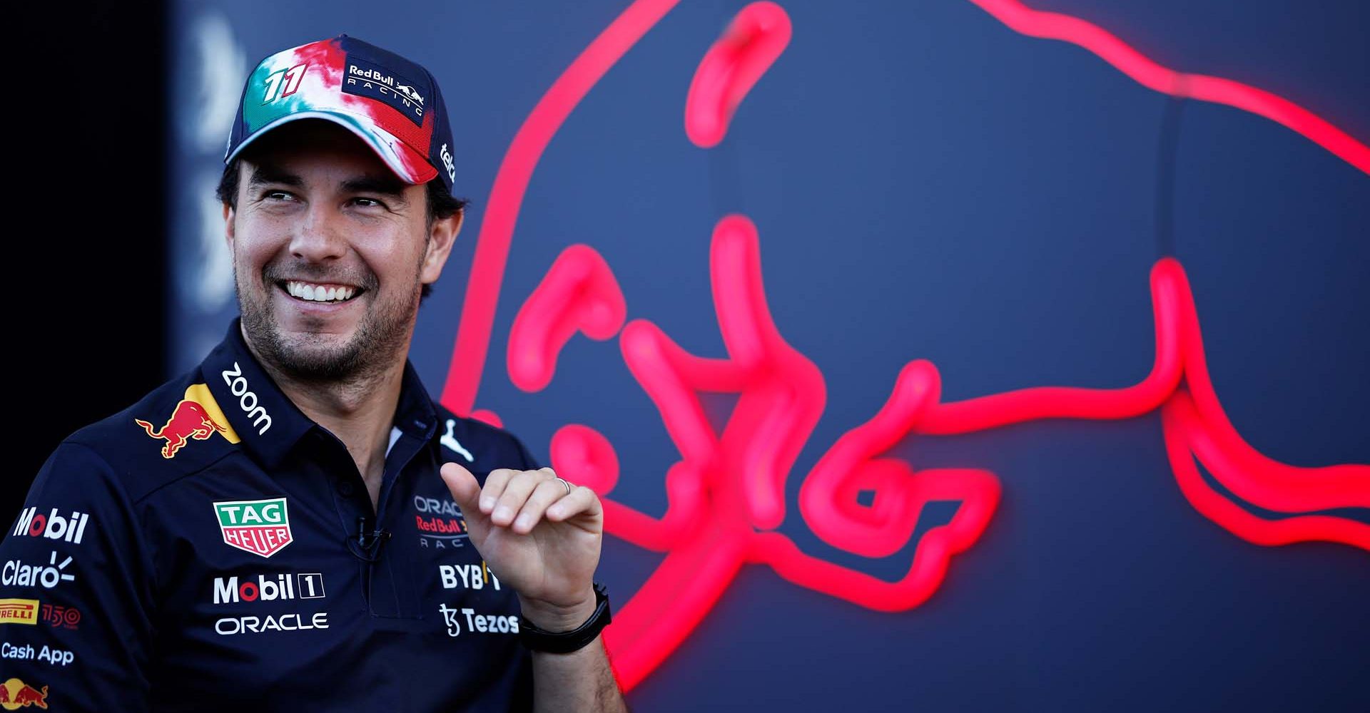 AUSTIN, TEXAS - OCTOBER 20: Sergio Perez of Mexico and Oracle Red Bull Racing talks to the media in the Paddock during previews ahead of the F1 Grand Prix of USA at Circuit of The Americas on October 20, 2022 in Austin, Texas. (Photo by Chris Graythen/Getty Images)