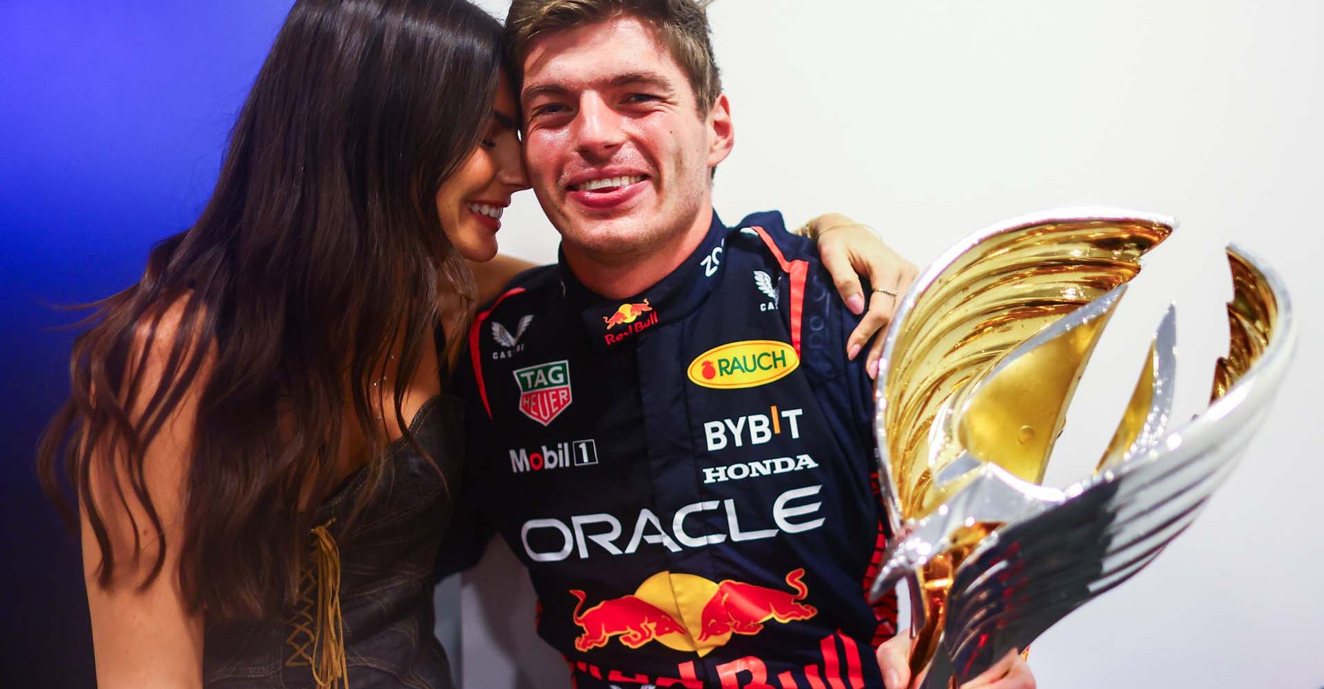 ABU DHABI, UNITED ARAB EMIRATES - NOVEMBER 26: Race winner Max Verstappen of the Netherlands and Oracle Red Bull Racing and Kelly Piquet pose for a photo after the F1 Grand Prix of Abu Dhabi at Yas Marina Circuit on November 26, 2023 in Abu Dhabi, United Arab Emirates. (Photo by Mark Thompson/Getty Images) // Getty Images / Red Bull Content Pool // SI202311260417 // Usage for editorial use only //