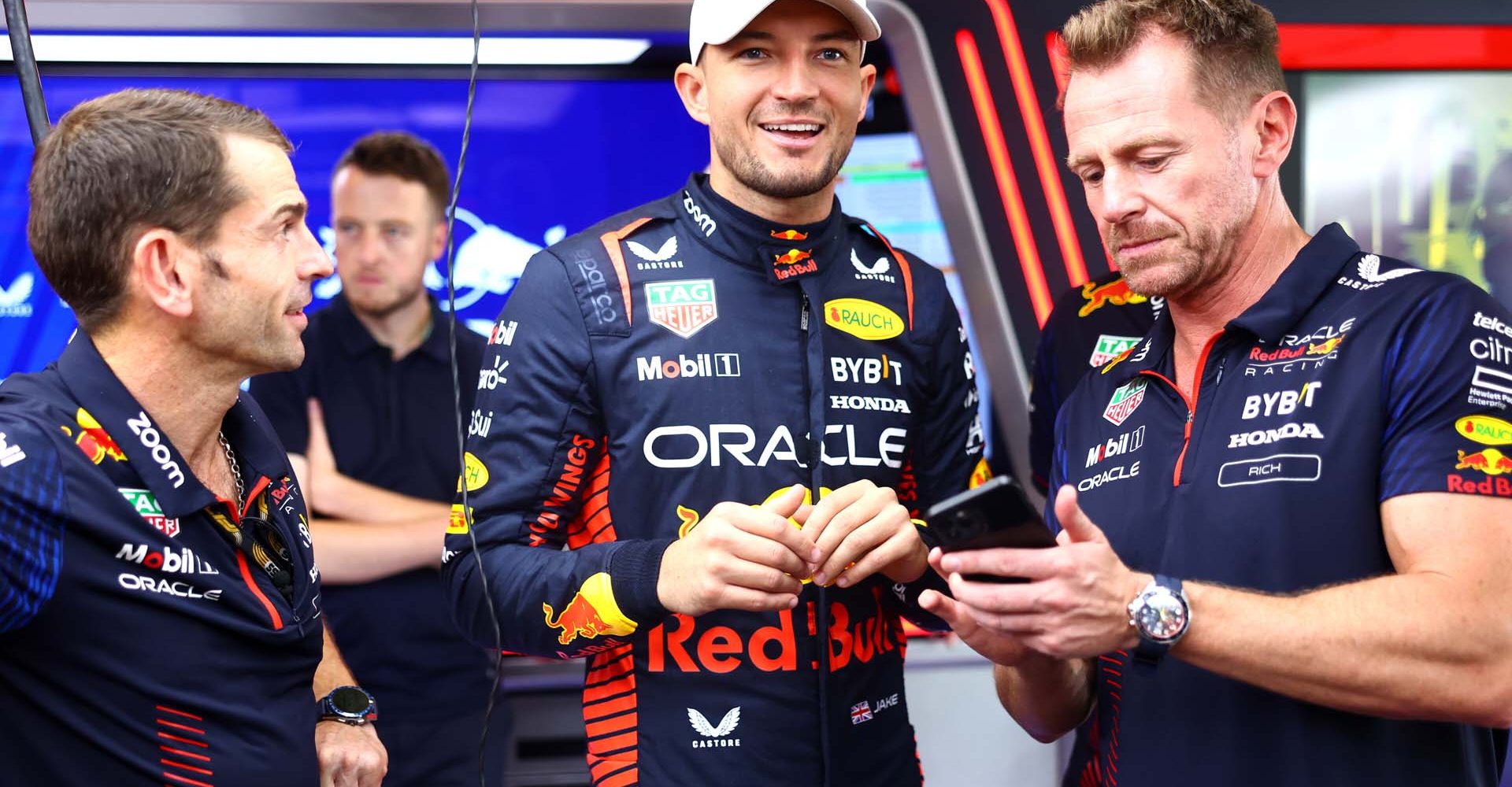 ABU DHABI, UNITED ARAB EMIRATES - NOVEMBER 23: Jake Dennis of Great Britain and Red Bull Racing looks on in the garage during previews ahead of the F1 Grand Prix of Abu Dhabi at Yas Marina Circuit on November 23, 2023 in Abu Dhabi, United Arab Emirates. (Photo by Mark Thompson/Getty Images) // Getty Images / Red Bull Content Pool // SI202311233867 // Usage for editorial use only //