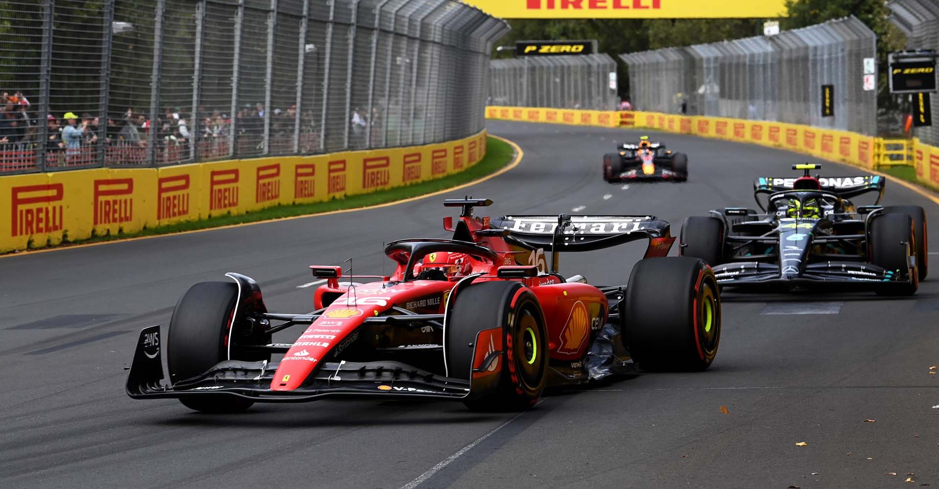 MELBOURNE GRAND PRIX CIRCUIT, AUSTRALIA - APRIL 01: Charles Leclerc, Ferrari SF-23, leads Sir Lewis Hamilton, Mercedes F1 W14, and Sergio Perez, Red Bull Racing RB19 during the Australian GP at Melbourne Grand Prix Circuit on Saturday April 01, 2023 in Melbourne, Australia. (Photo by Mark Sutton / LAT Images)