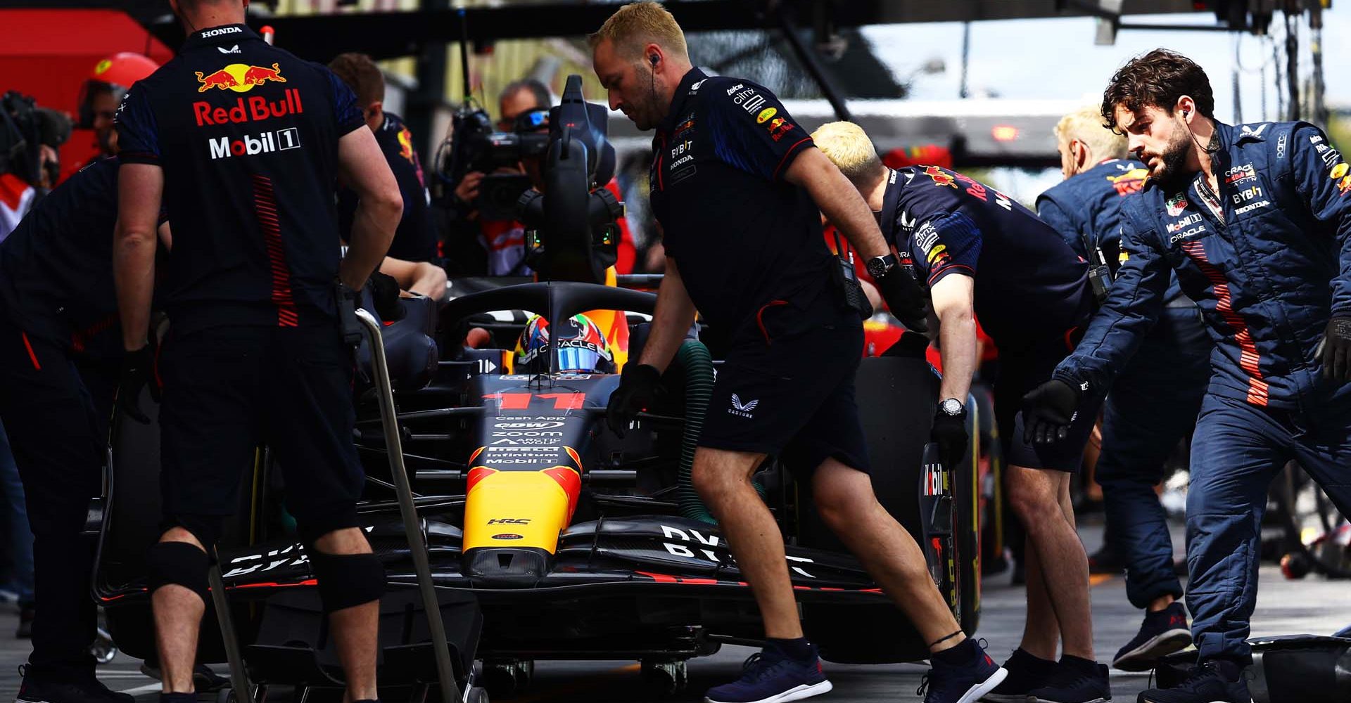 MELBOURNE, AUSTRALIA - MARCH 31: Sergio Perez of Mexico driving the (11) Oracle Red Bull Racing RB19 stops in the Pitlane during practice ahead of the F1 Grand Prix of Australia at Albert Park Grand Prix Circuit on March 31, 2023 in Melbourne, Australia. (Photo by Mark Thompson/Getty Images)