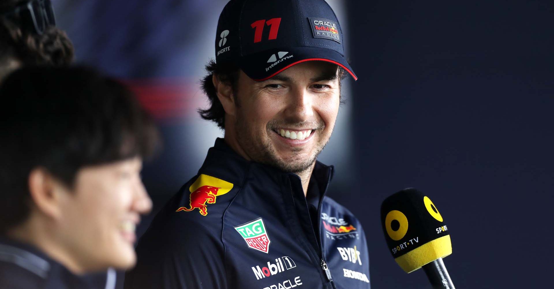 MELBOURNE, AUSTRALIA - MARCH 30: Sergio Perez of Mexico and Oracle Red Bull Racing talks to the media in the Paddock during previews ahead of the F1 Grand Prix of Australia at Albert Park Grand Prix Circuit on March 30, 2023 in Melbourne, Australia. (Photo by Peter Fox/Getty Images)