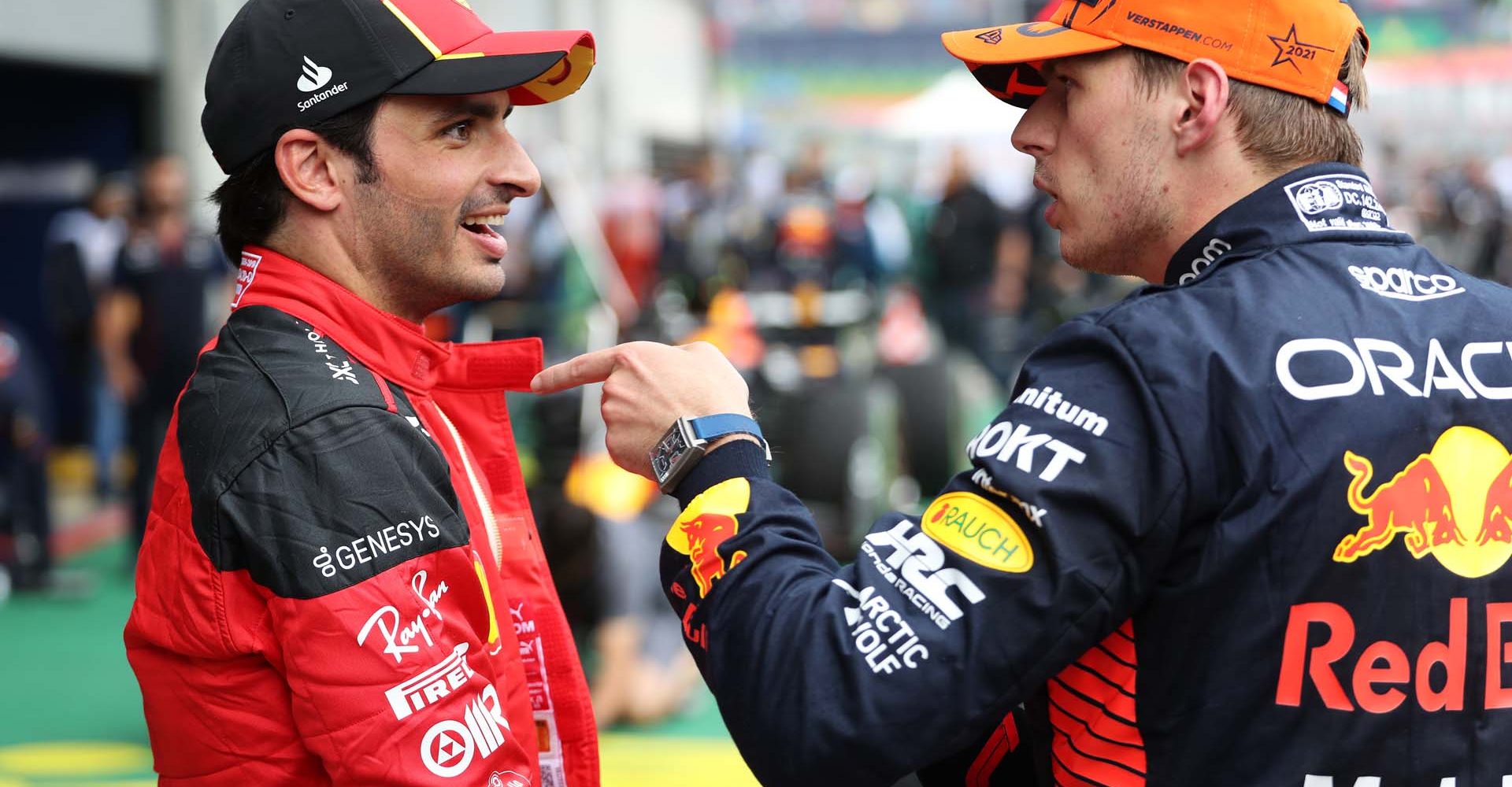 SPIELBERG, AUSTRIA - JULY 01: Sprint winner Max Verstappen of the Netherlands and Oracle Red Bull Racing and Third placed Carlos Sainz of Spain and Ferrari talk in parc ferme during the Sprint ahead of the F1 Grand Prix of Austria at Red Bull Ring on July 01, 2023 in Spielberg, Austria. (Photo by Peter Fox/Getty Images)