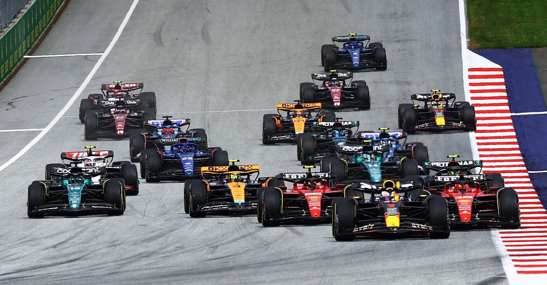 SPIELBERG, AUSTRIA - JULY 02: Max Verstappen of the Netherlands driving the (1) Oracle Red Bull Racing RB19 leads the field into turn one at the start during the F1 Grand Prix of Austria at Red Bull Ring on July 02, 2023 in Spielberg, Austria. (Photo by Mark Thompson/Getty Images)