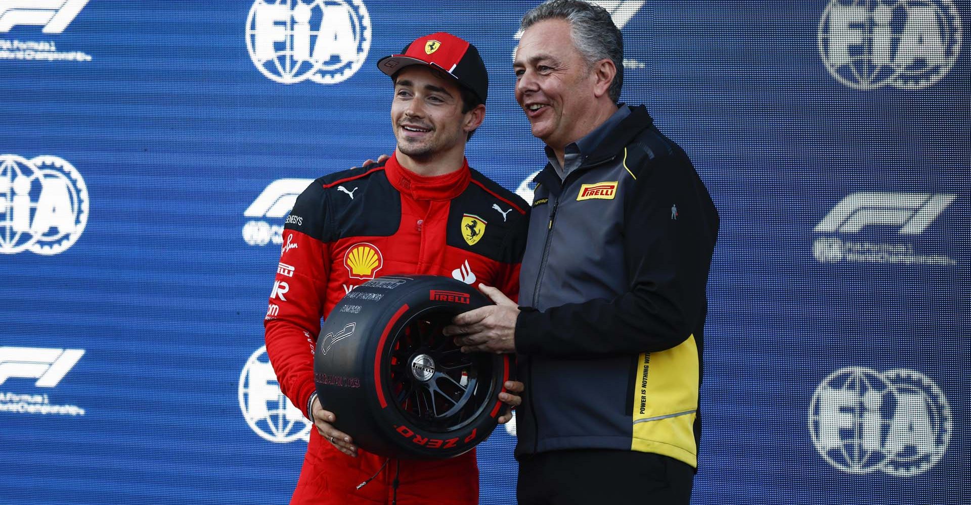 BAKU CITY CIRCUIT, AZERBAIJAN - APRIL 28: Charles Leclerc, Scuderia Ferrari, receives his Pirelli Pole Position Award from Mario Isola, Racing Manager, Pirelli Motorsport during the Azerbaijan GP at Baku City Circuit on Friday April 28, 2023 in Baku, Azerbaijan. (Photo by Zak Mauger / LAT Images)