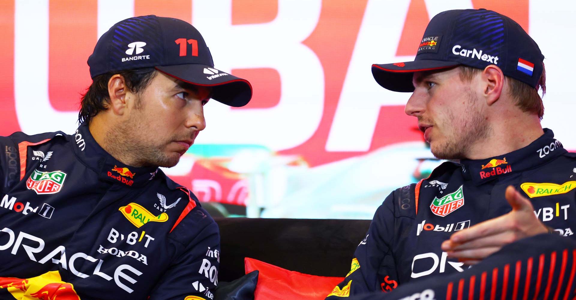 BAKU, AZERBAIJAN - APRIL 29: Sprint winner Sergio Perez of Mexico and Oracle Red Bull Racing and Third placed Max Verstappen of the Netherlands and Oracle Red Bull Racing attend the press conference after the Sprint ahead of the F1 Grand Prix of Azerbaijan at Baku City Circuit on April 29, 2023 in Baku, Azerbaijan. (Photo by Bryn Lennon/Getty Images)