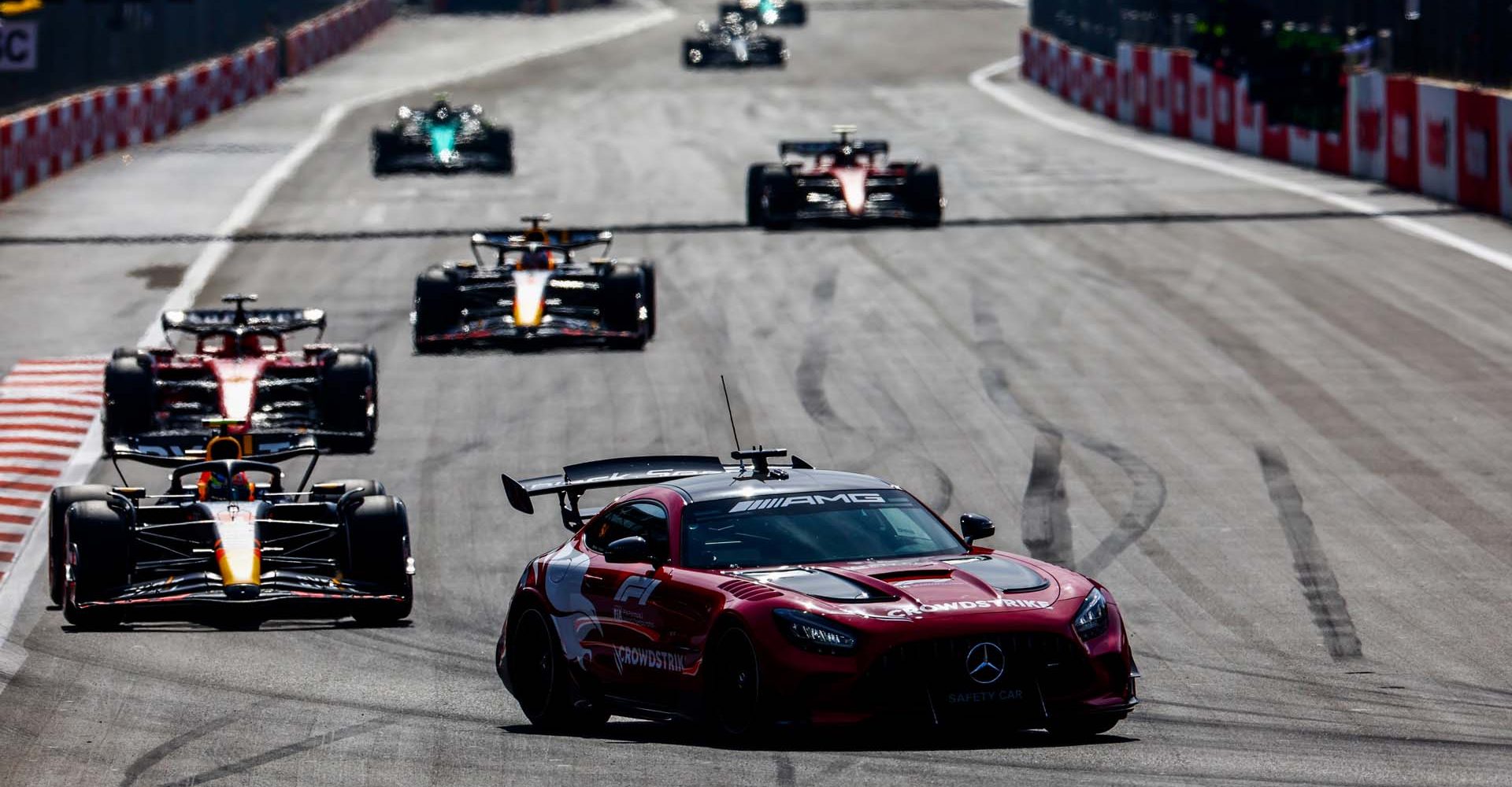 BAKU, AZERBAIJAN - APRIL 30: The FIA Safety Car leads Sergio Perez of Mexico driving the (11) Oracle Red Bull Racing RB19 on track during the F1 Grand Prix of Azerbaijan at Baku City Circuit on April 30, 2023 in Baku, Azerbaijan. (Photo by Mark Thompson/Getty Images)