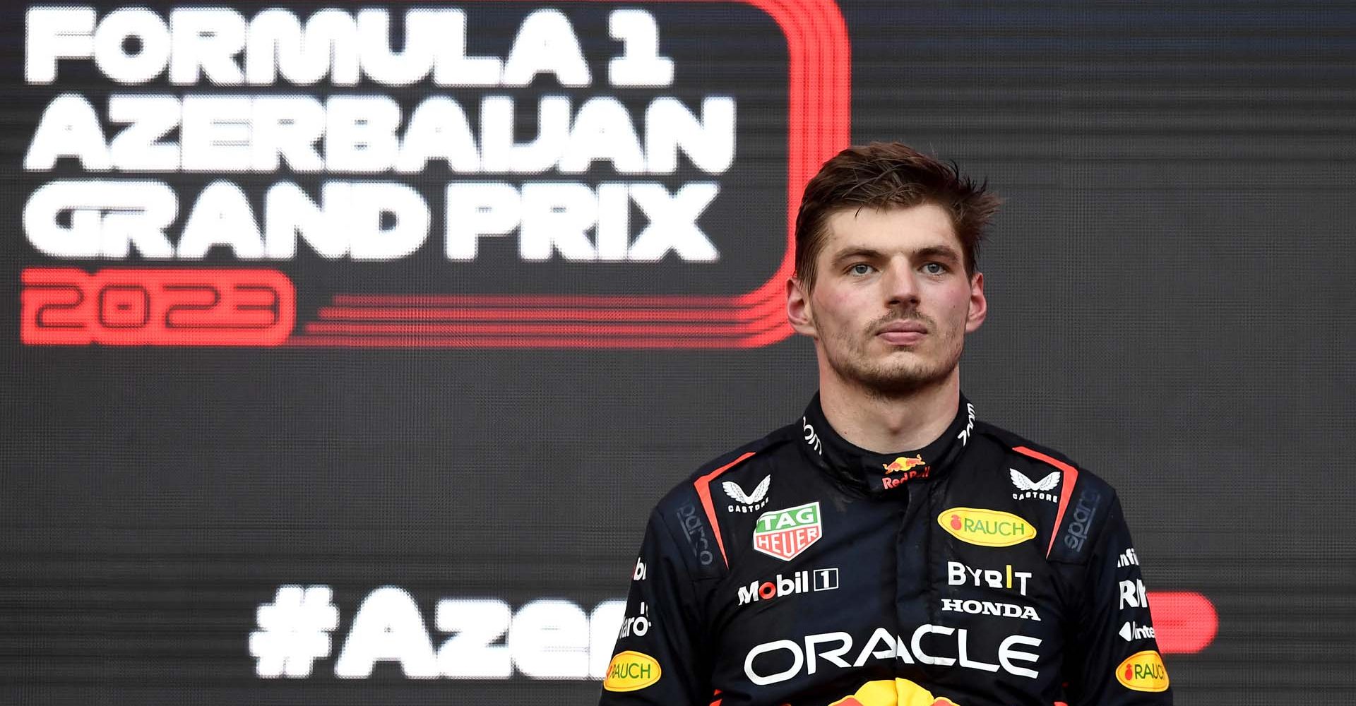 BAKU, AZERBAIJAN - APRIL 30: Second placed Max Verstappen of the Netherlands and Oracle Red Bull Racing celebrates on the podium during the F1 Grand Prix of Azerbaijan at Baku City Circuit on April 30, 2023 in Baku, Azerbaijan. (Photo by Rudy Carezzevoli/Getty Images)