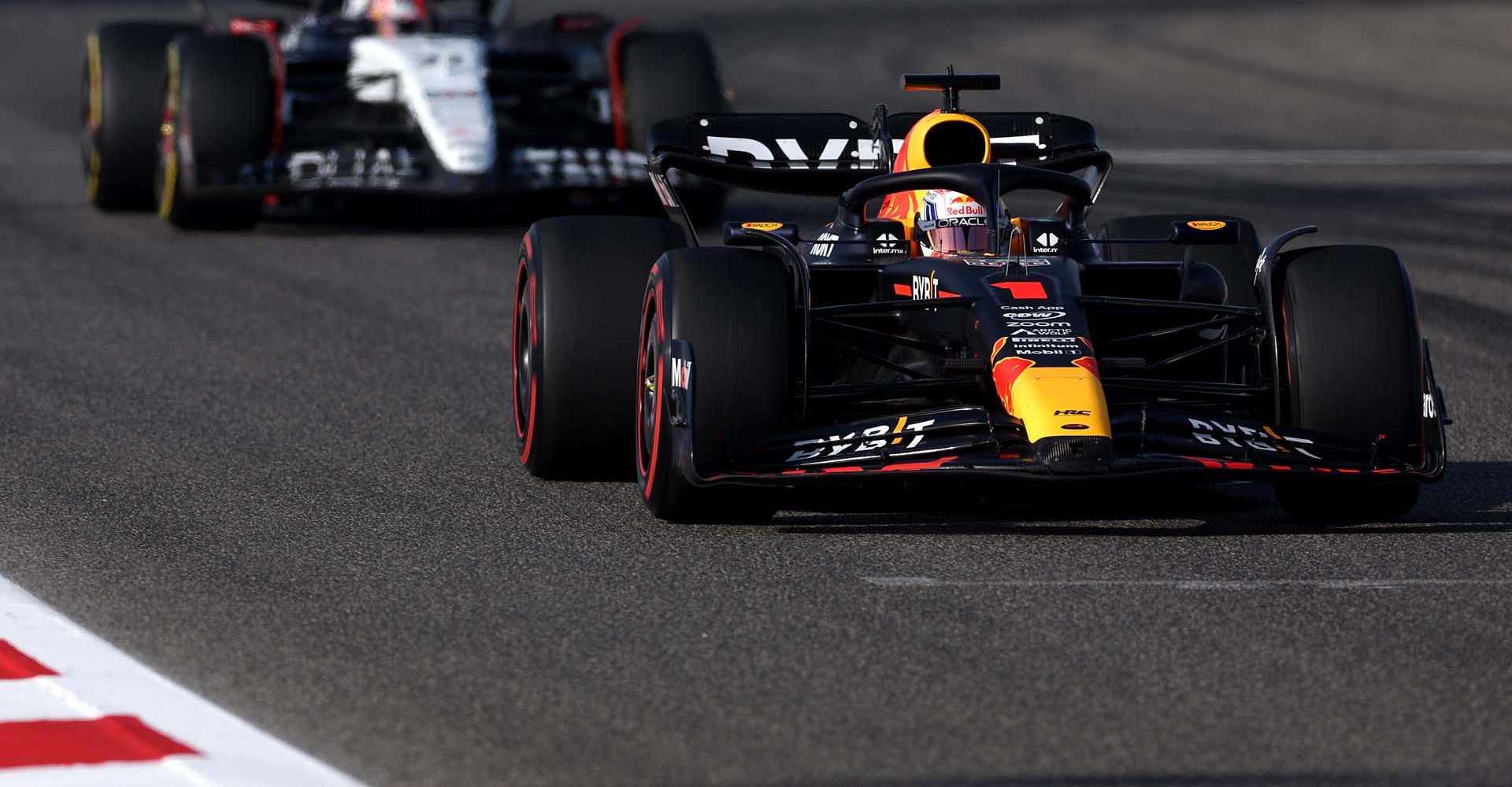 BAHRAIN, BAHRAIN - MARCH 03: Max Verstappen of the Netherlands driving the (1) Oracle Red Bull Racing RB19 leads Nyck de Vries of Netherlands driving the (21) Scuderia AlphaTauri AT04 on track during practice ahead of the F1 Grand Prix of Bahrain at Bahrain International Circuit on March 03, 2023 in Bahrain, Bahrain. (Photo by Lars Baron/Getty Images)