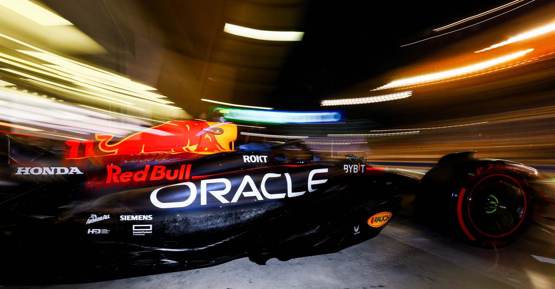 BAHRAIN, BAHRAIN - MARCH 04: Sergio Perez of Mexico driving the (11) Oracle Red Bull Racing RB19 leaves the garage during qualifying ahead of the F1 Grand Prix of Bahrain at Bahrain International Circuit on March 04, 2023 in Bahrain, Bahrain. (Photo by Mark Thompson/Getty Images)