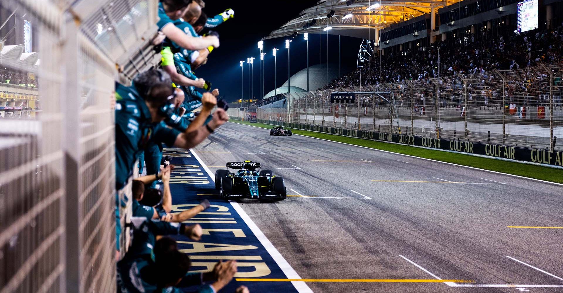 action, Portrait, Finish, TS-Live, Bahrain International Circuit, GP2301a, F1, GP, Bahrain
The Aston Martin team cheer Fernando Alonso, Aston Martin AMR23, 3rd position, over the line