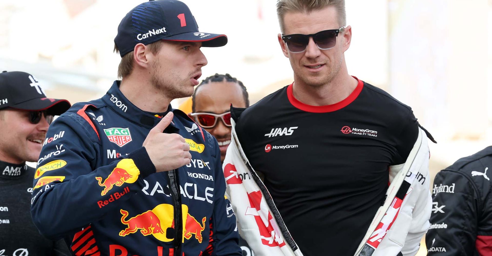 BAHRAIN, BAHRAIN - MARCH 05: Max Verstappen of the Netherlands and Oracle Red Bull Racing talks with Nico Hulkenberg of Germany and Haas F1 on the drivers parade prior to the F1 Grand Prix of Bahrain at Bahrain International Circuit on March 05, 2023 in Bahrain, Bahrain. (Photo by Lars Baron/Getty Images)