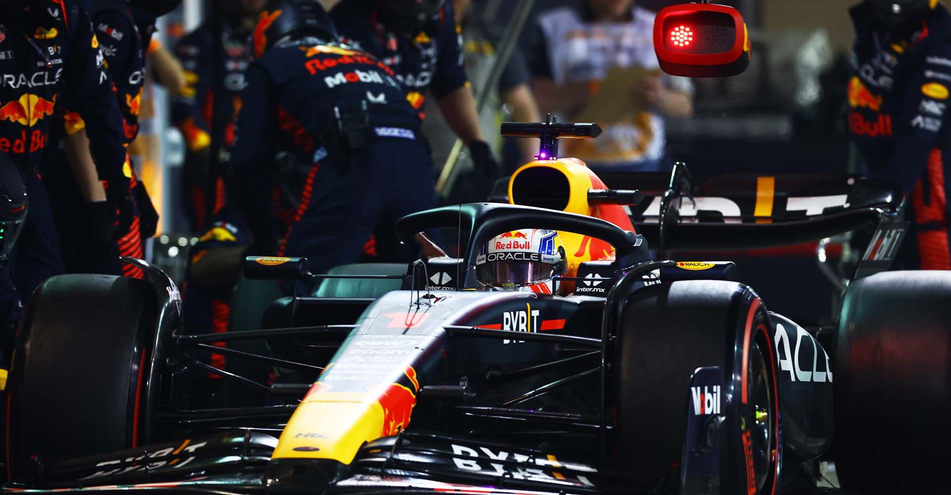 BAHRAIN, BAHRAIN - MARCH 05: Max Verstappen of the Netherlands driving the (1) Oracle Red Bull Racing RB19 makes a pitstop during the F1 Grand Prix of Bahrain at Bahrain International Circuit on March 05, 2023 in Bahrain, Bahrain. (Photo by Mark Thompson/Getty Images)