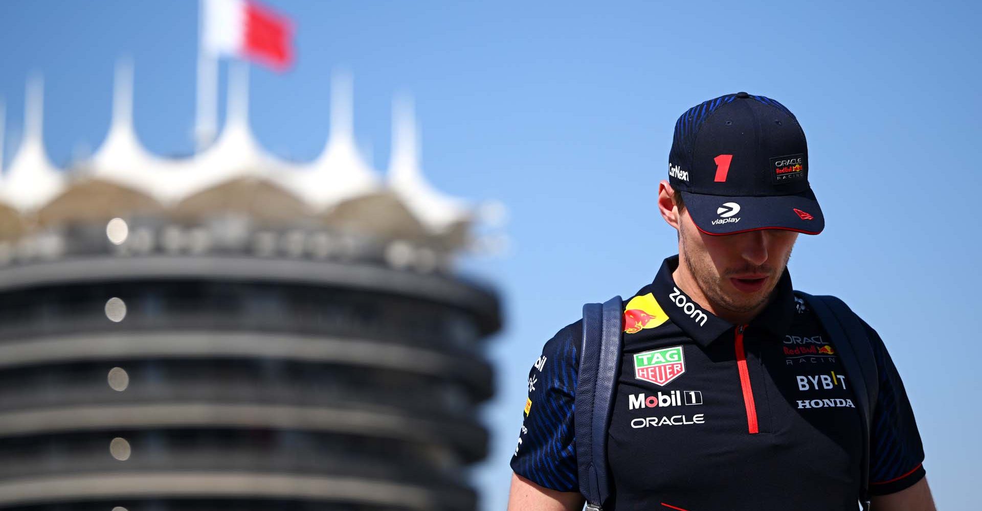 BAHRAIN, BAHRAIN - MARCH 02: Max Verstappen of the Netherlands and Oracle Red Bull Racing walks in the Paddock during previews ahead of the F1 Grand Prix of Bahrain at Bahrain International Circuit on March 02, 2023 in Bahrain, Bahrain. (Photo by Clive Mason/Getty Images)