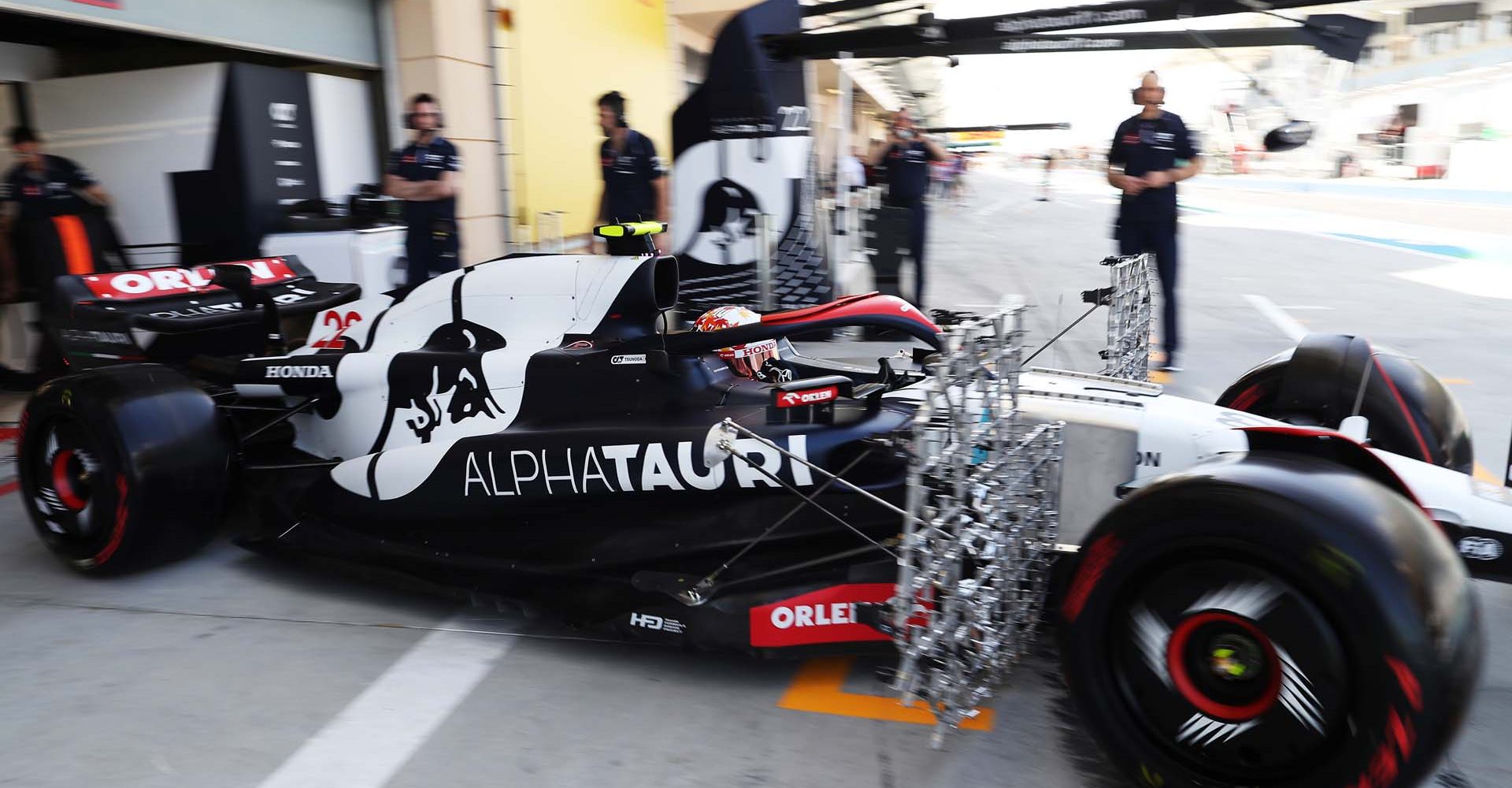 BAHRAIN, BAHRAIN - FEBRUARY 23: Yuki Tsunoda of Japan driving the (22) Scuderia AlphaTauri AT04 leaves the garage during day one of F1 Testing at Bahrain International Circuit on February 23, 2023 in Bahrain, Bahrain. (Photo by Peter Fox/Getty Images)