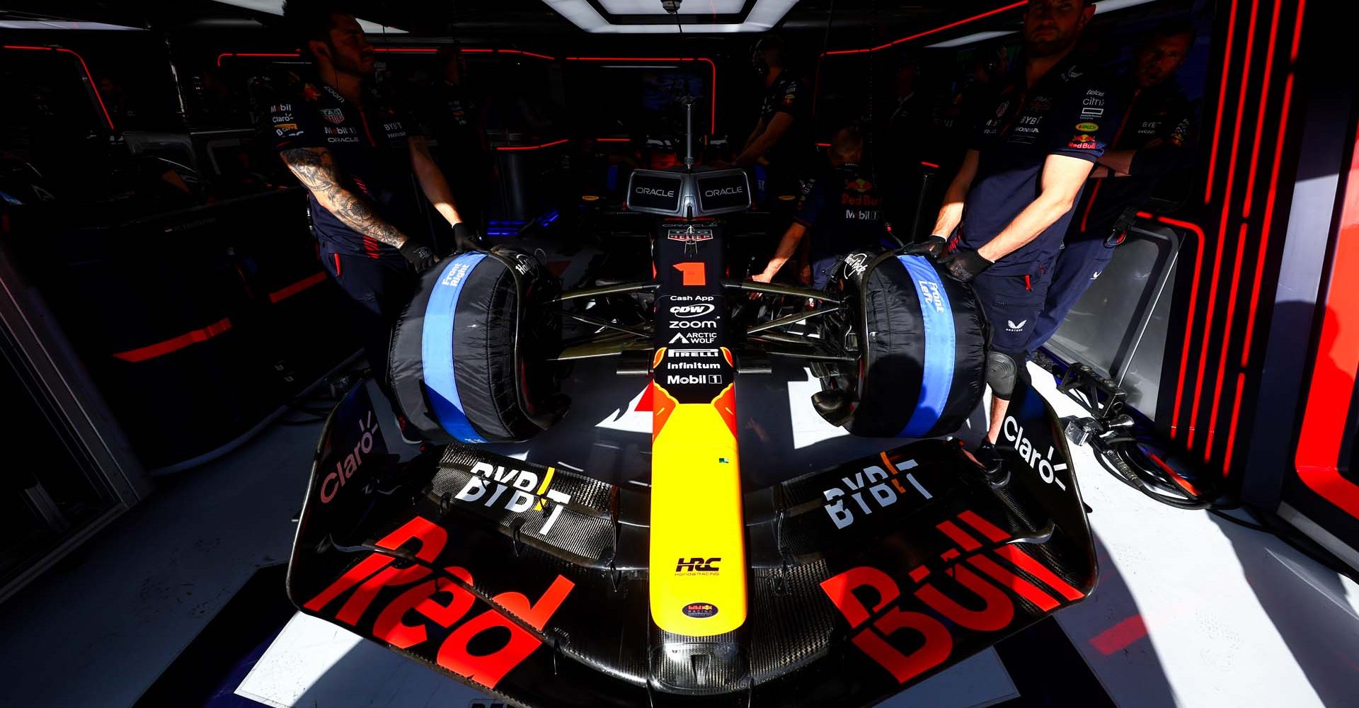 SPA, BELGIUM - JULY 28: The Red Bull Racing team prepare for Max Verstappen of the Netherlands and Oracle Red Bull Racing to leave the garage during qualifying ahead of the F1 Grand Prix of Belgium at Circuit de Spa-Francorchamps on July 28, 2023 in Spa, Belgium. (Photo by Mark Thompson/Getty Images)