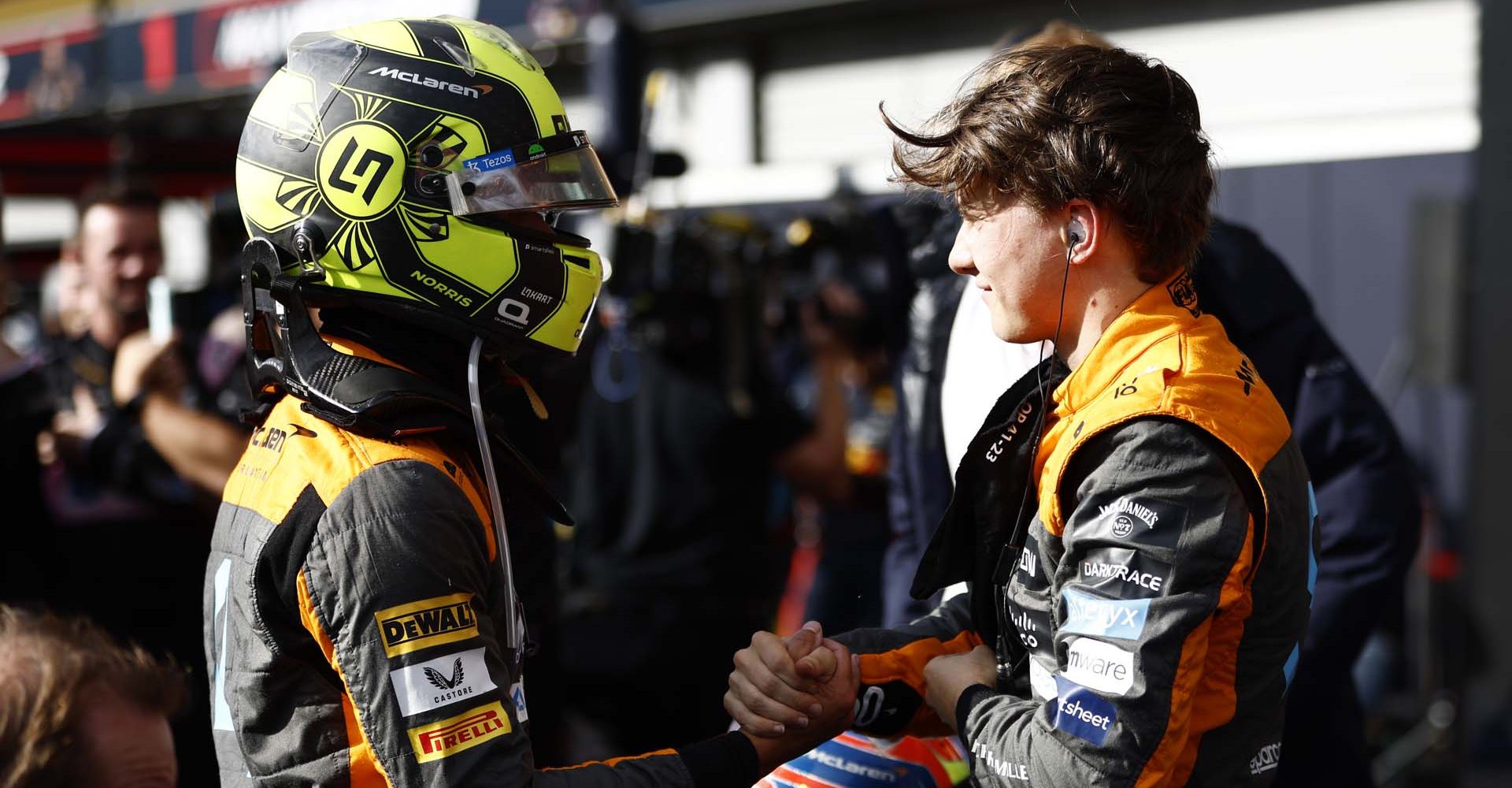 Lando Norris, McLaren, congratulates Oscar Piastri, McLaren, 2nd position, in Parc Ferme after the Sprint