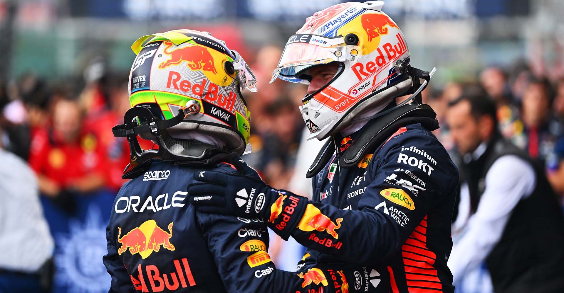 SPA, BELGIUM - JULY 30: Race winner Max Verstappen of the Netherlands and Oracle Red Bull Racing and Second placed Sergio Perez of Mexico and Oracle Red Bull Racing talk in parc ferme during the F1 Grand Prix of Belgium at Circuit de Spa-Francorchamps on July 30, 2023 in Spa, Belgium. (Photo by Dan Mullan/Getty Images)