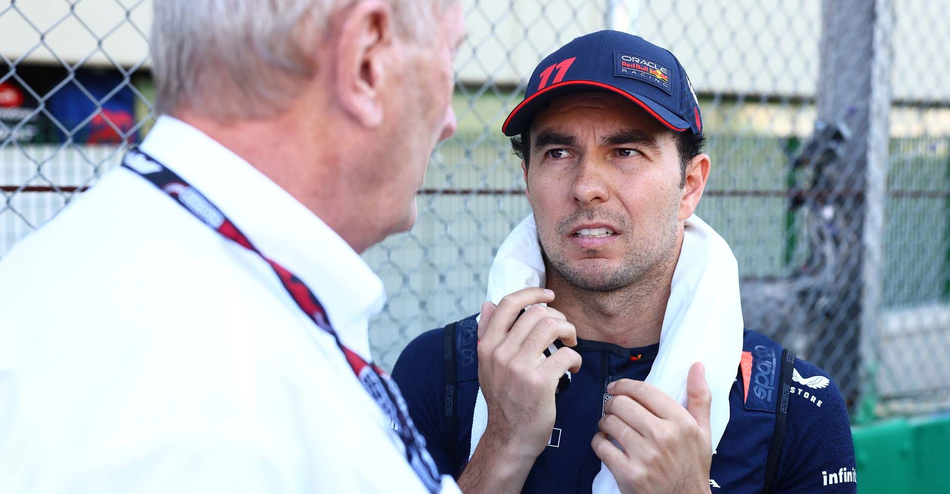 SAO PAULO, BRAZIL - NOVEMBER 04: Sergio Perez of Mexico and Oracle Red Bull Racing talks with Red Bull Racing Team Consultant Dr Helmut Marko on the grid prior to the Sprint ahead of the F1 Grand Prix of Brazil at Autodromo Jose Carlos Pace on November 04, 2023 in Sao Paulo, Brazil. (Photo by Mark Thompson/Getty Images) // Getty Images / Red Bull Content Pool // SI202311040435 // Usage for editorial use only //