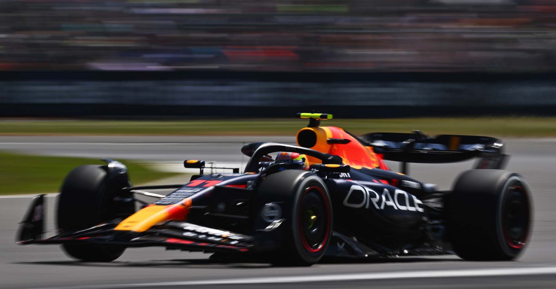 NORTHAMPTON, ENGLAND - JULY 07: Sergio Perez of Mexico driving the (11) Oracle Red Bull Racing RB19 on track during practice ahead of the F1 Grand Prix of Great Britain at Silverstone Circuit on July 07, 2023 in Northampton, England. (Photo by Dan Mullan/Getty Images)